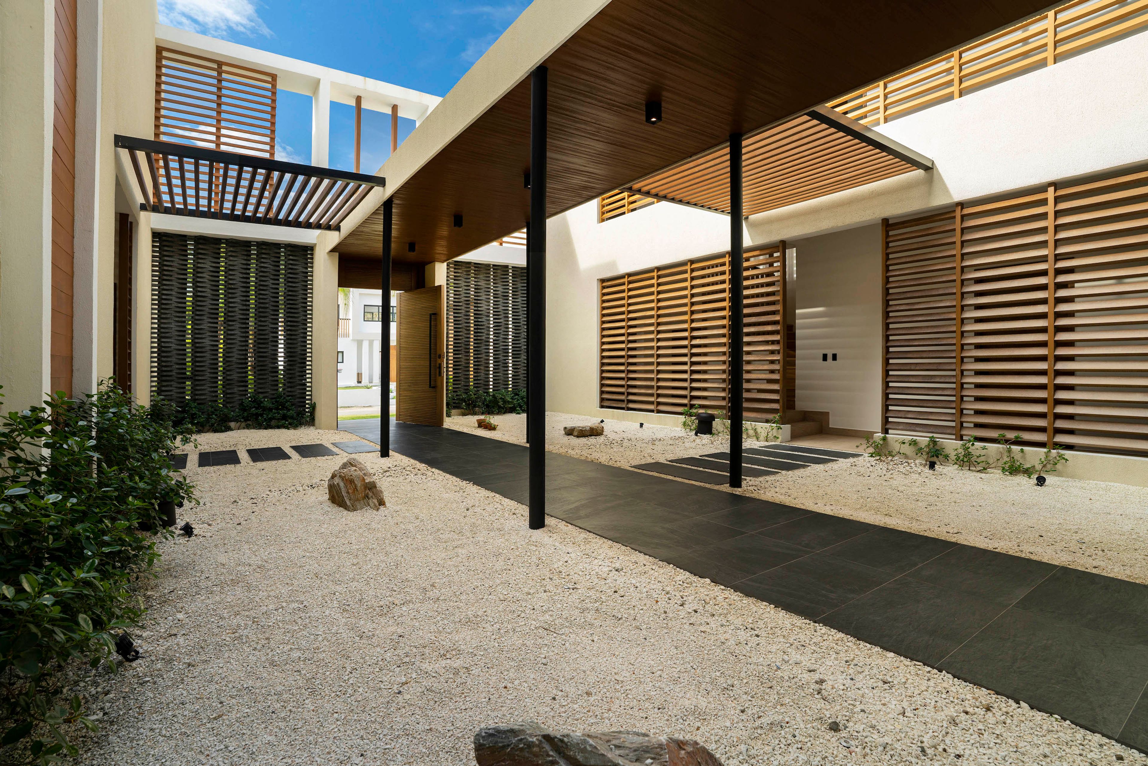 Central tropical courtyard at Villa Roge beachfront estate
