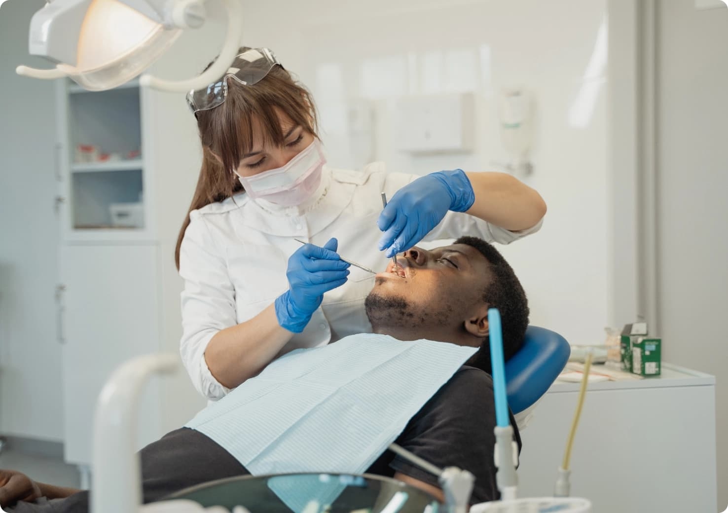 dental patient being treated on dental chair