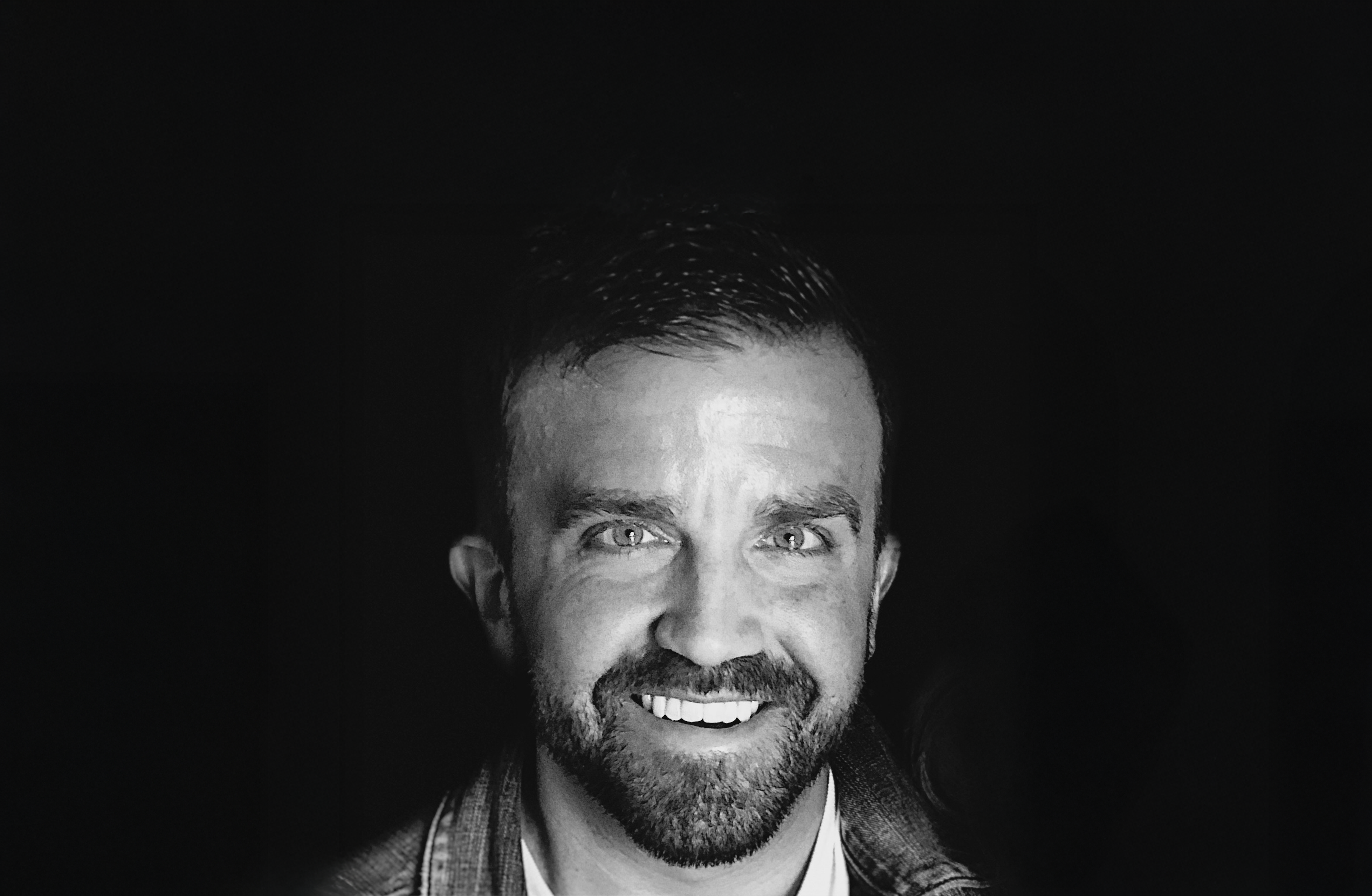 portrait of a young man in black and white