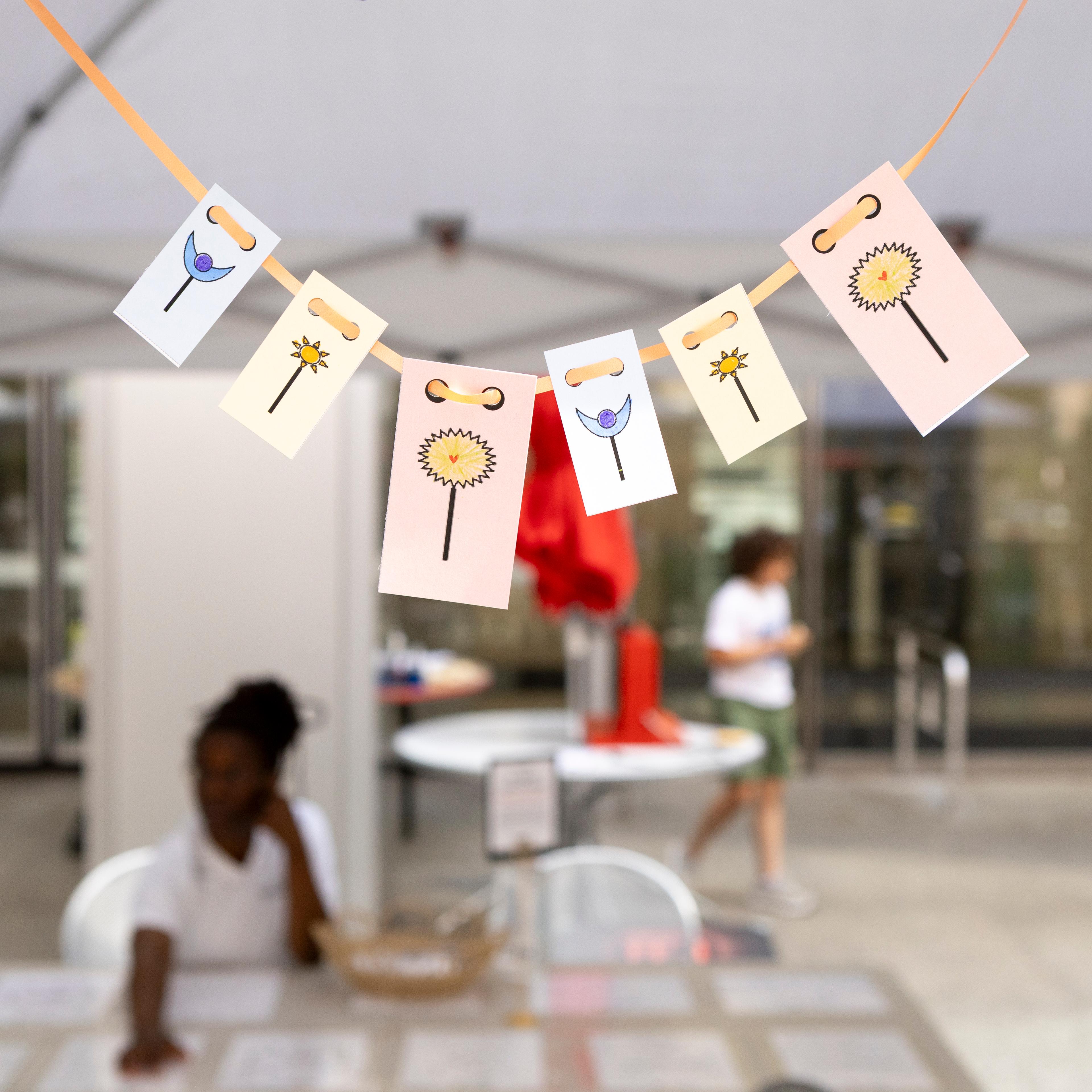 hanging cards with colored flowers