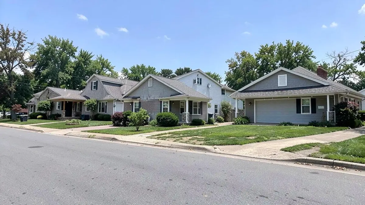 Cape and colonial homes along a residential street near Main Street in Farmingdale, NY, Nassau County