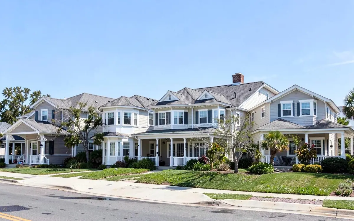 Cape and high-ranch homes on a residential block in Oceanside, NY, Nassau County