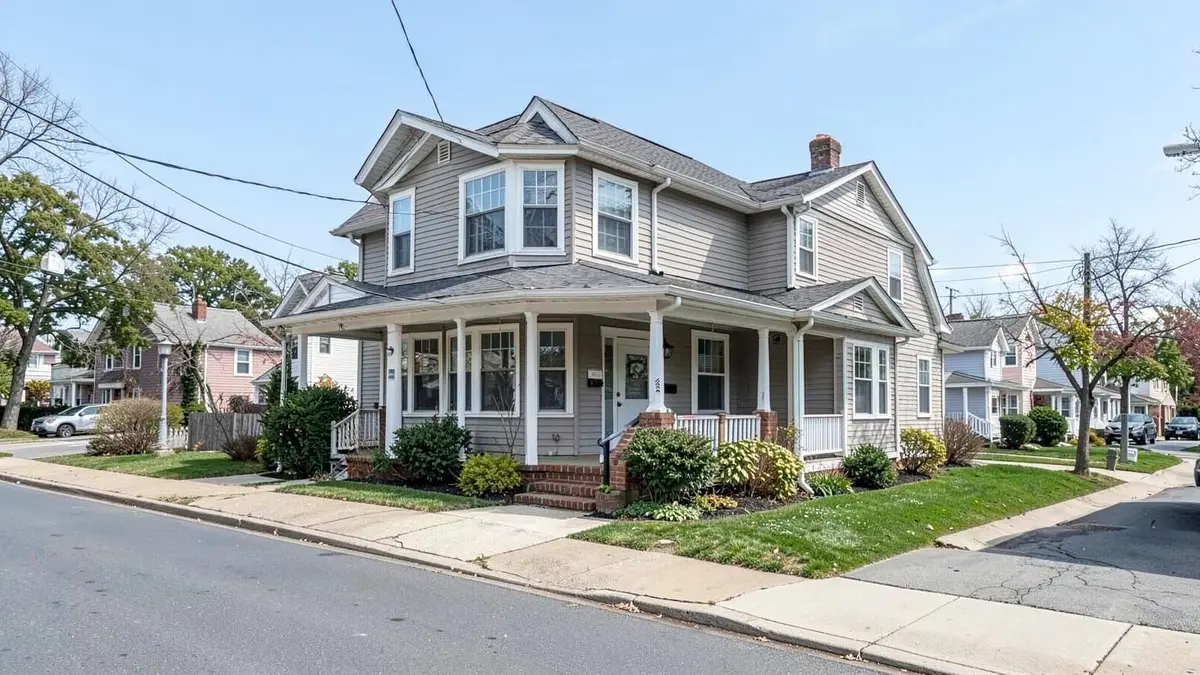 Postwar cape style home on a residential street in Franklin Square, NY in the Town of Hempstead