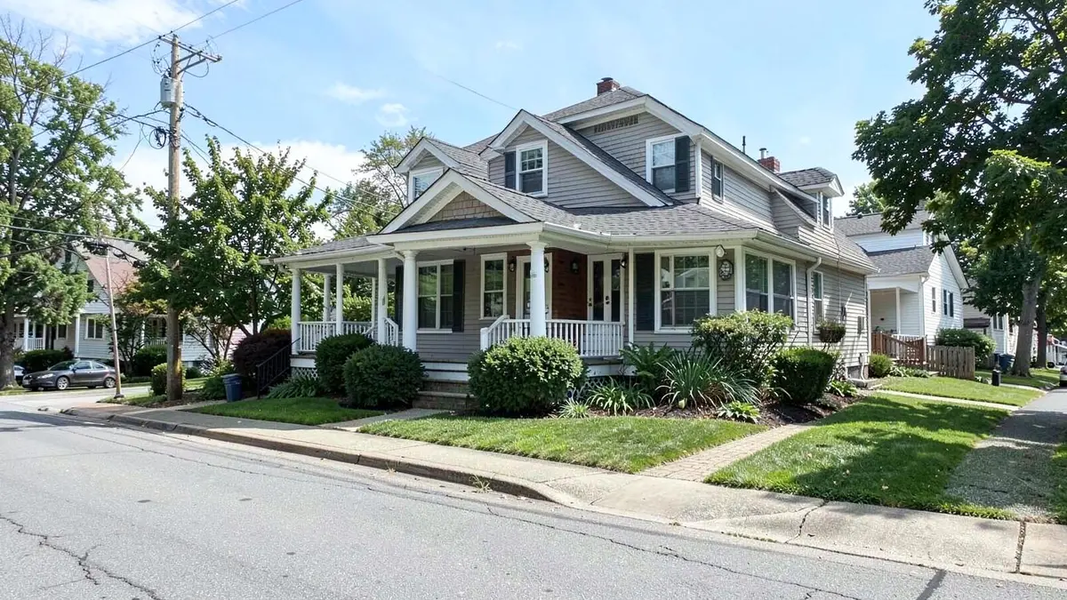 Cape style home on a residential street in Roosevelt, NY in the Town of Hempstead