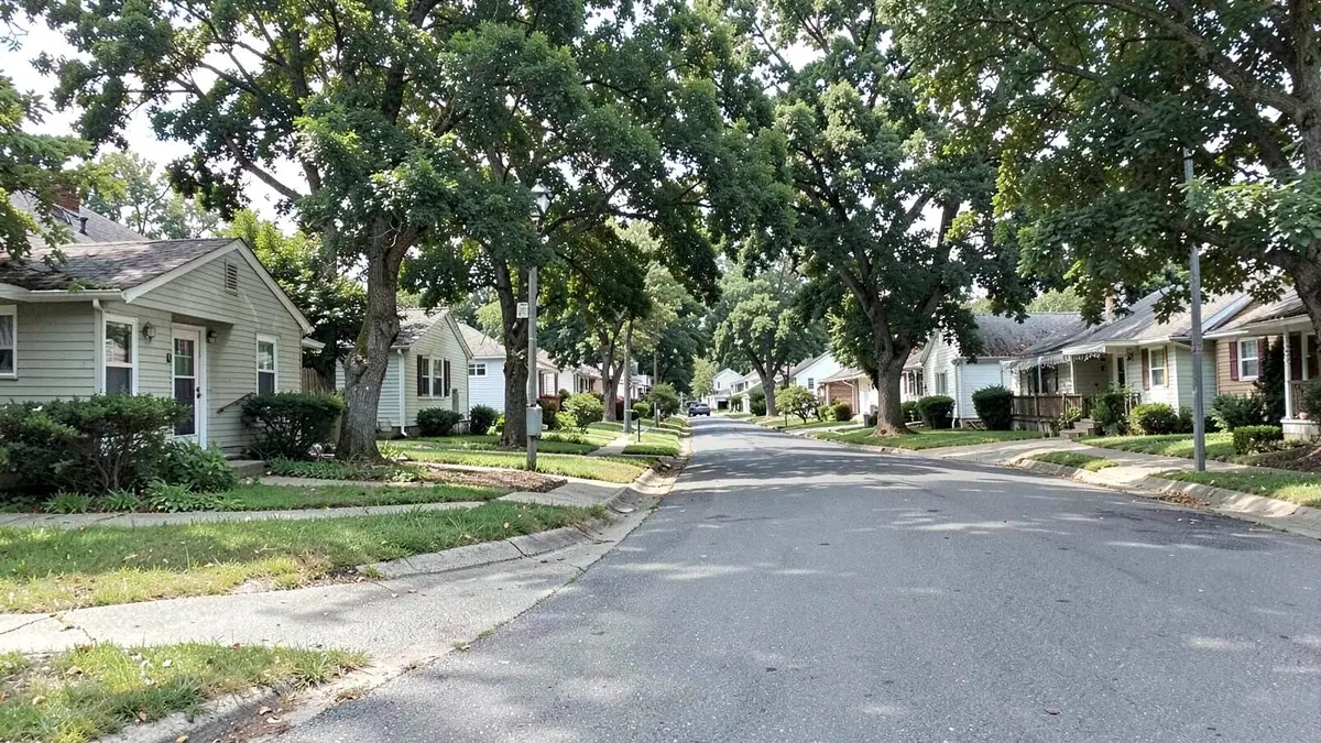 Long-held colonial homes on a tree-lined street in Islip hamlet, NY, Town of Islip, Suffolk County