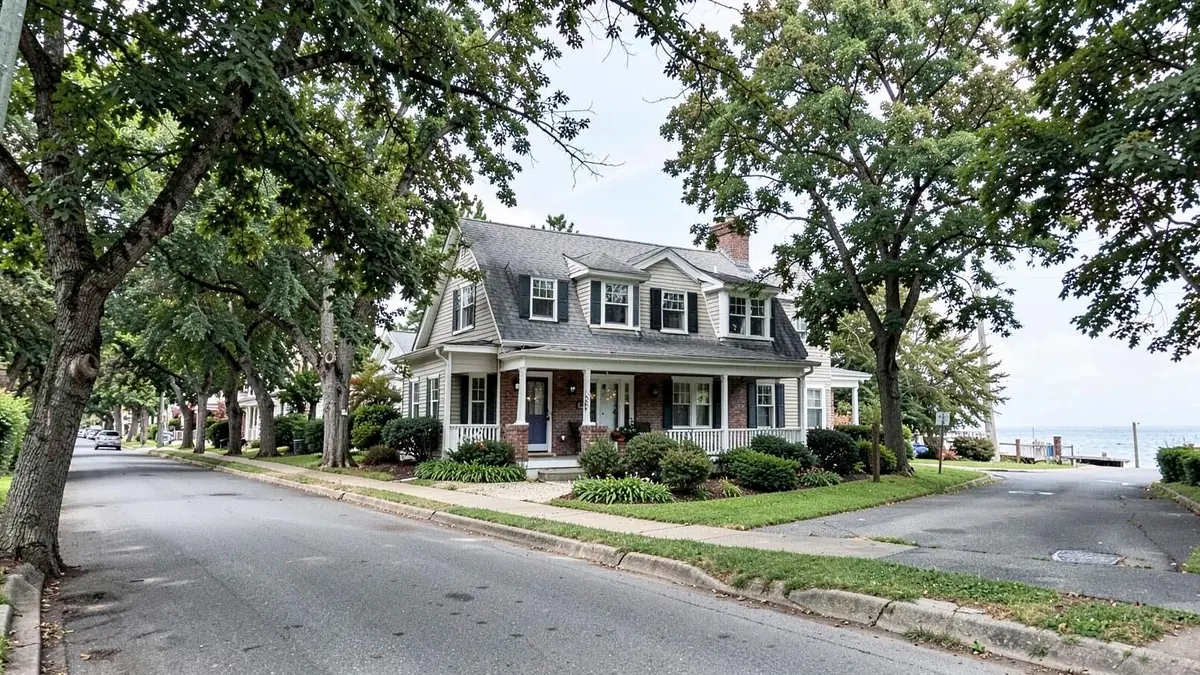 Cape style home on a tree lined street in Bay Shore, NY near the Great South Bay