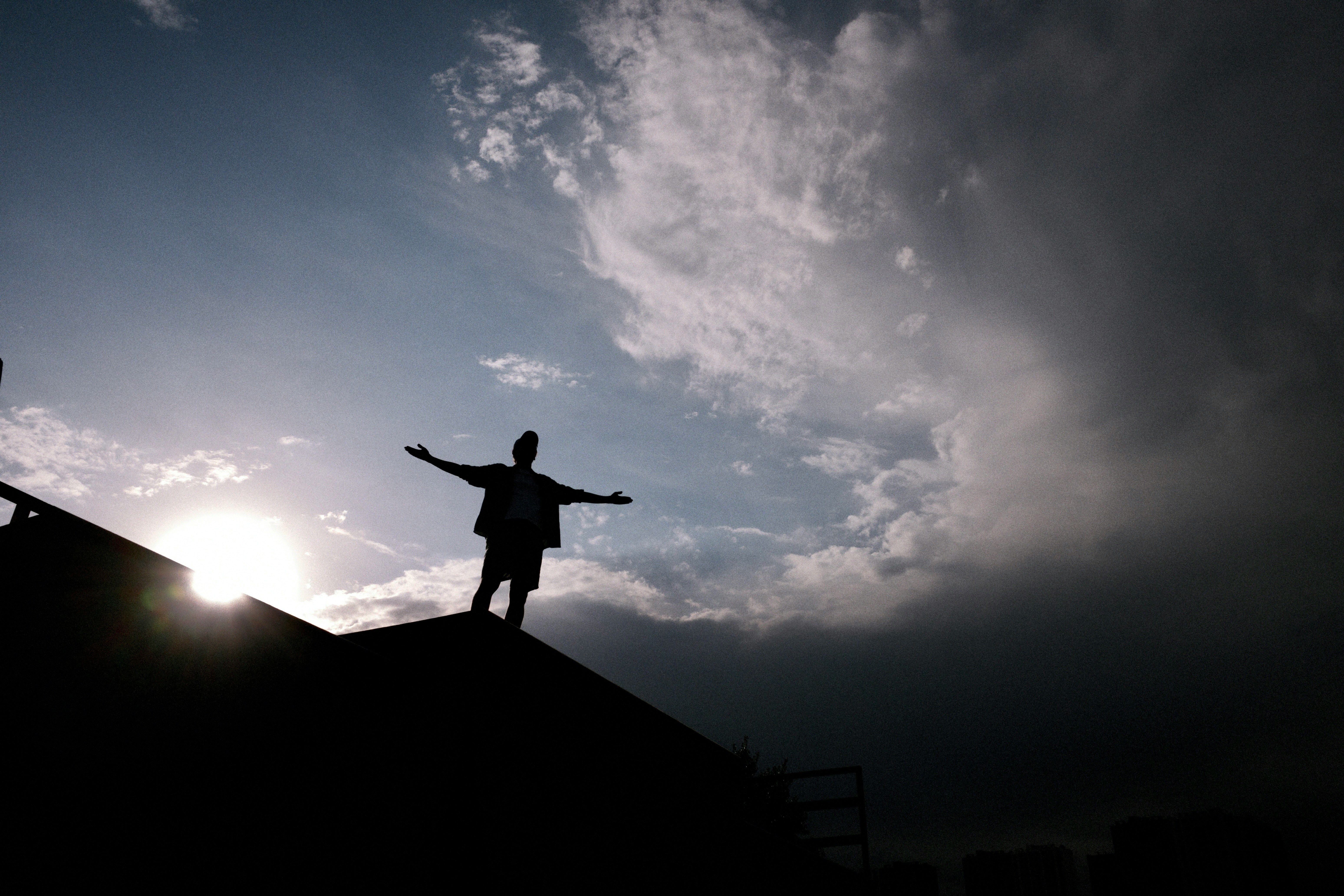 confident person standing on a mountain