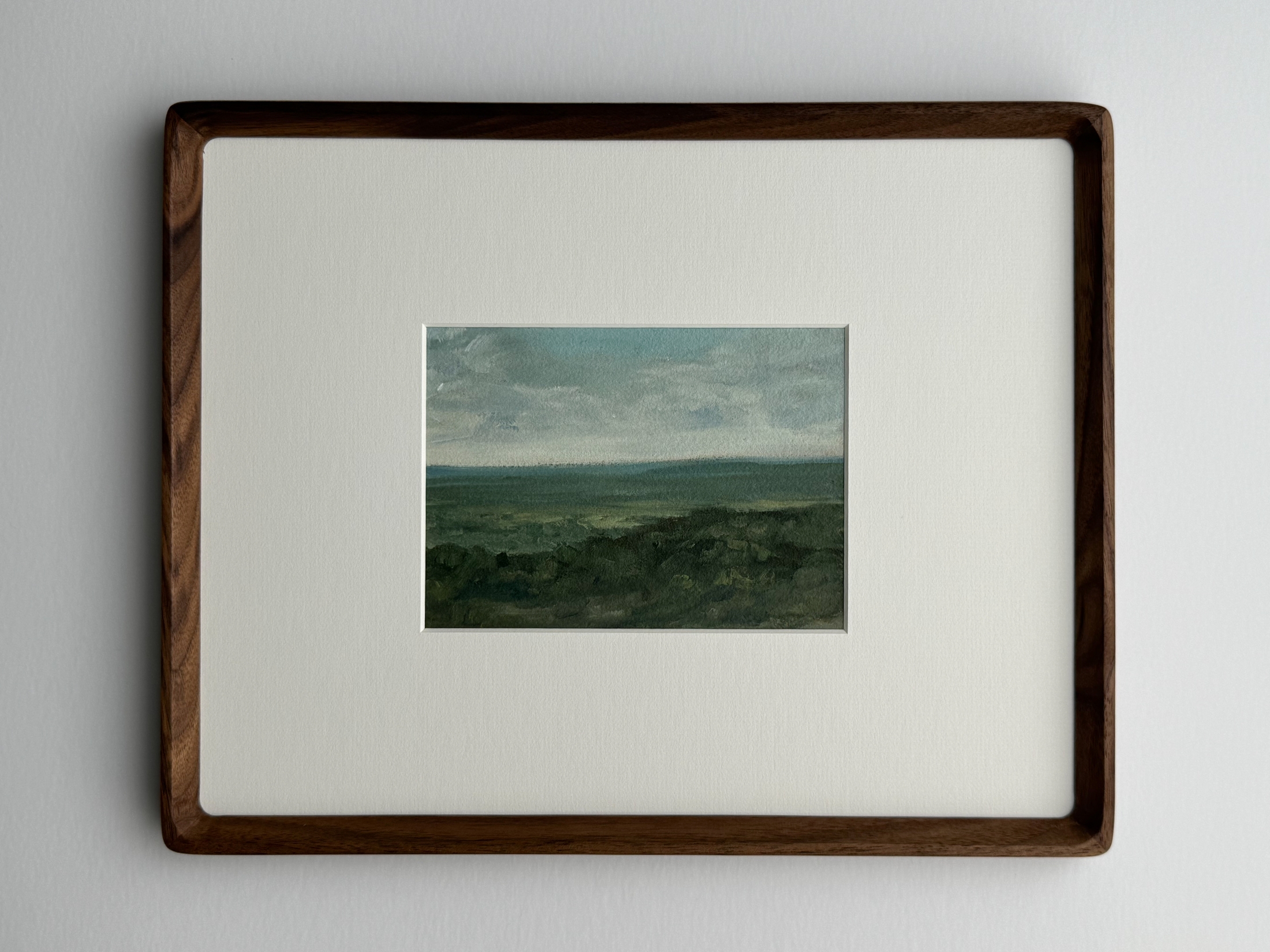 Hillside study painting in frame