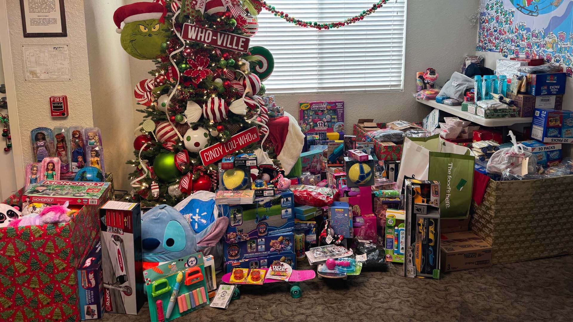 Christmas 2023 at Impact The Grinch inspired tree provided by Nancy Reynolds at Fancy Nancy Trees