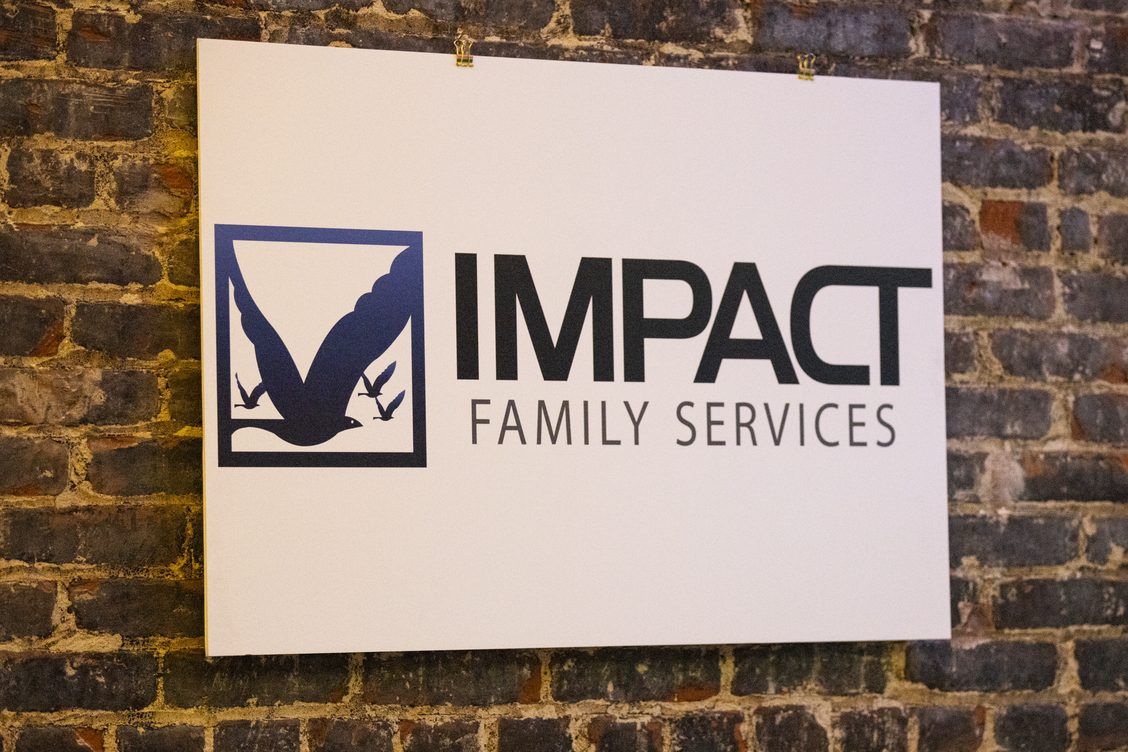Impacting Lives: A Fundraising Dinner for Impact Families During the event a new logo for our Family Services department was unveiled.