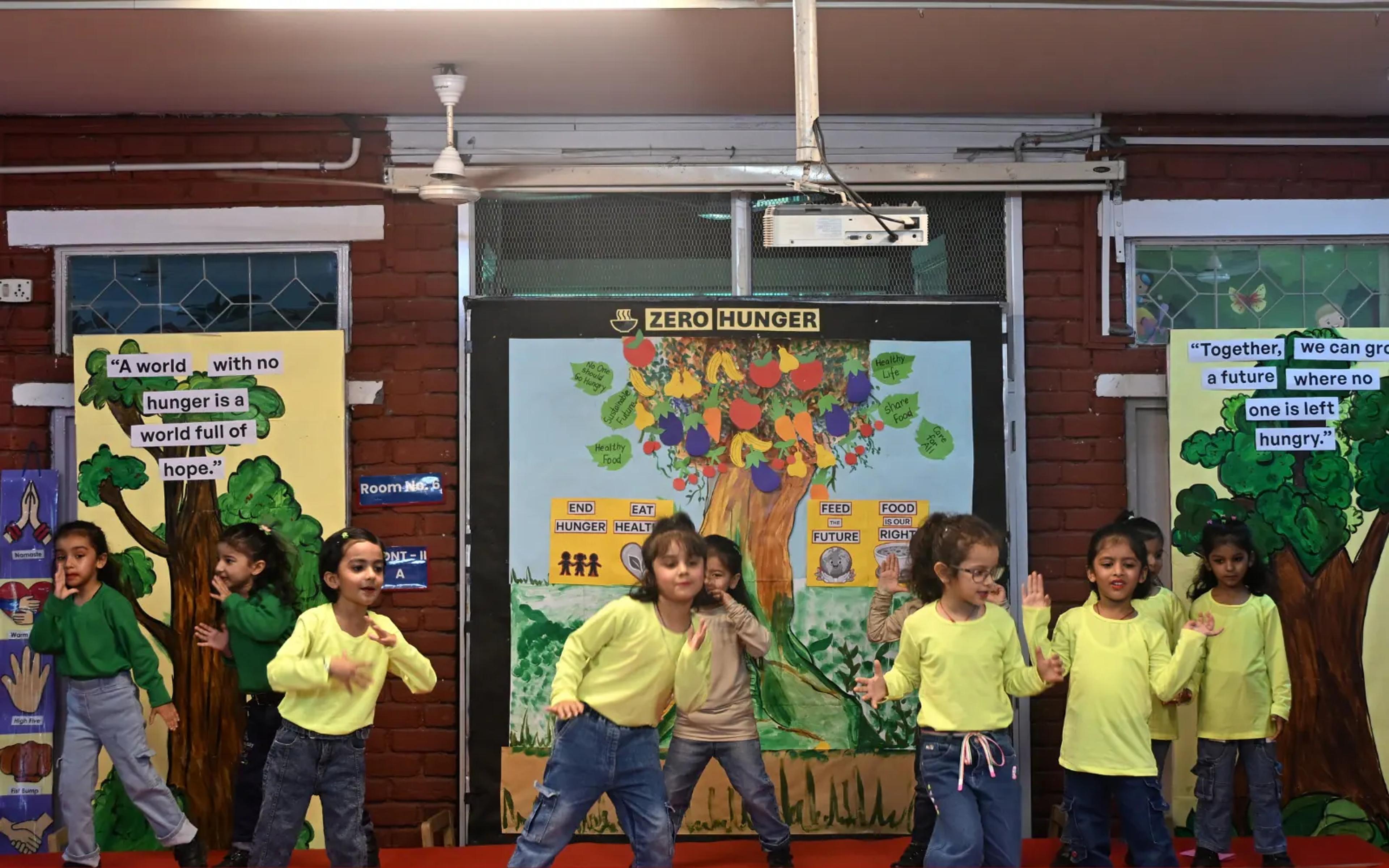 Children performing an environmental awareness skit