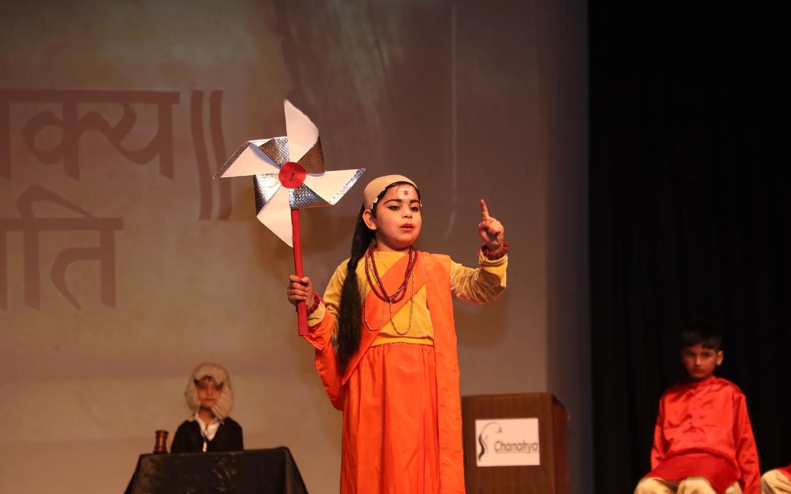 A child presenting a Hindi recitation