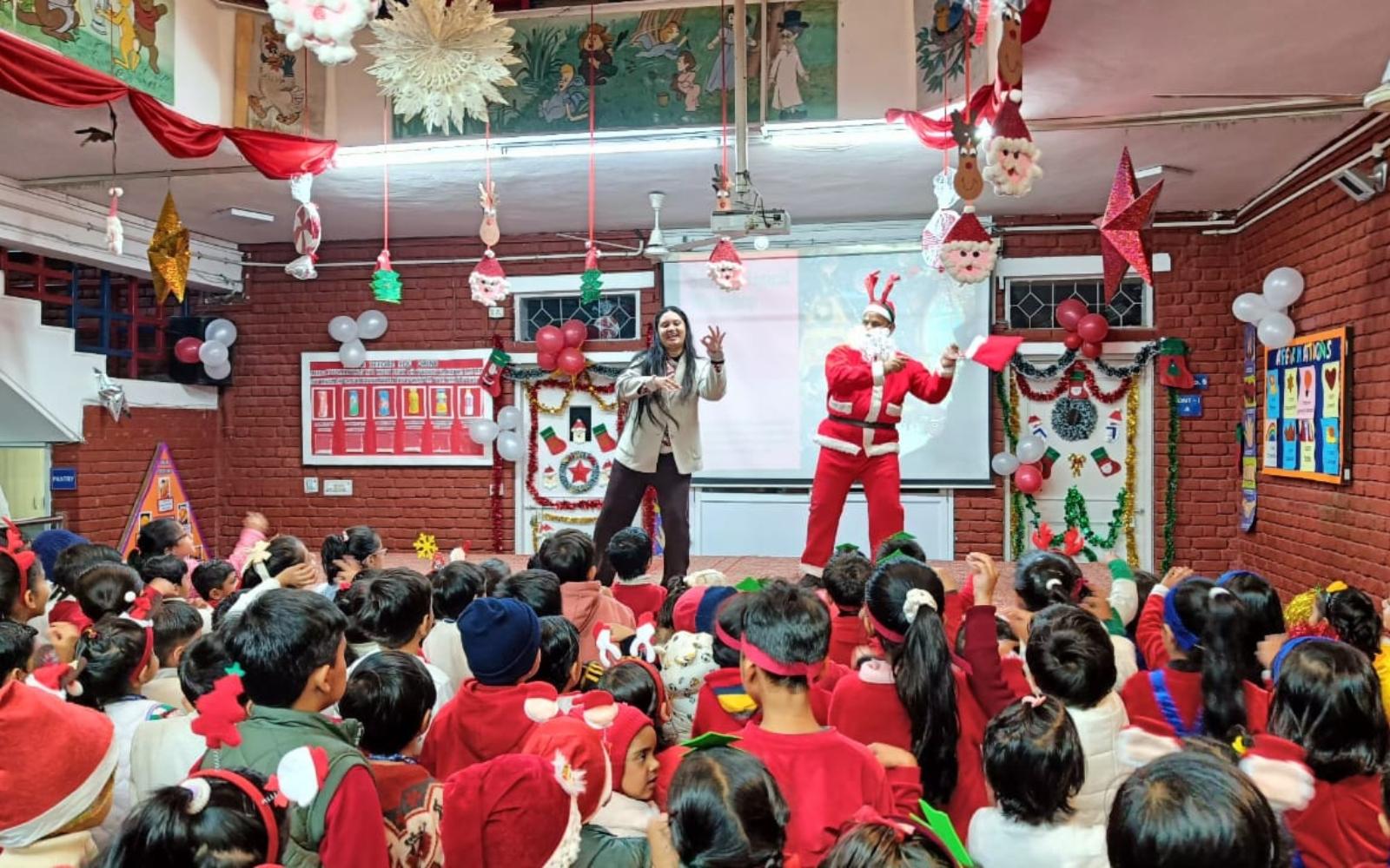 Children enjoying a Christmas celebration with Santa