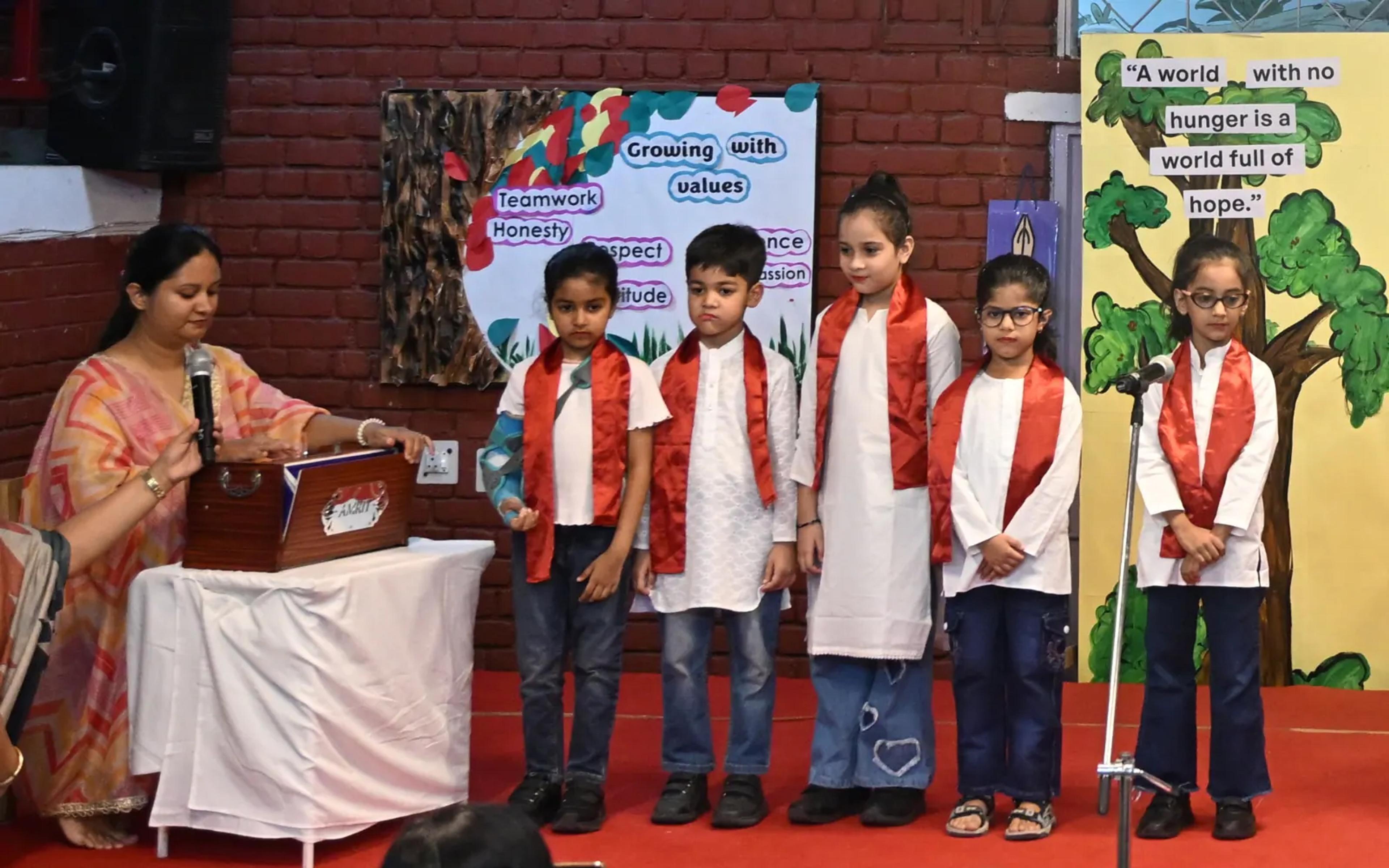 Young learners presenting a group song