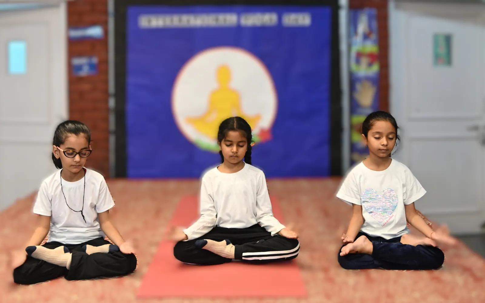 Young learners practising meditation
