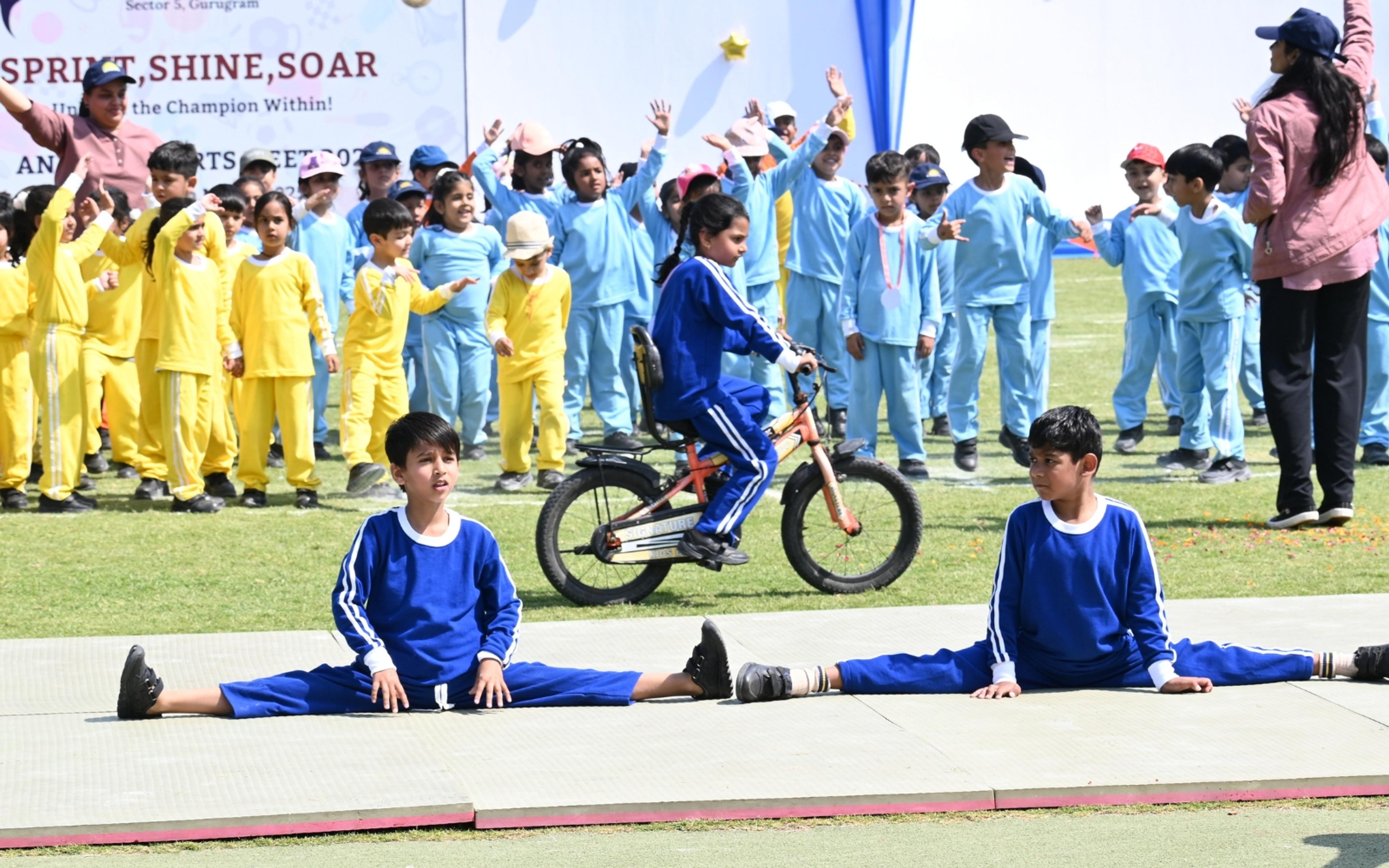 Children presenting coordinated sports activities on the school field