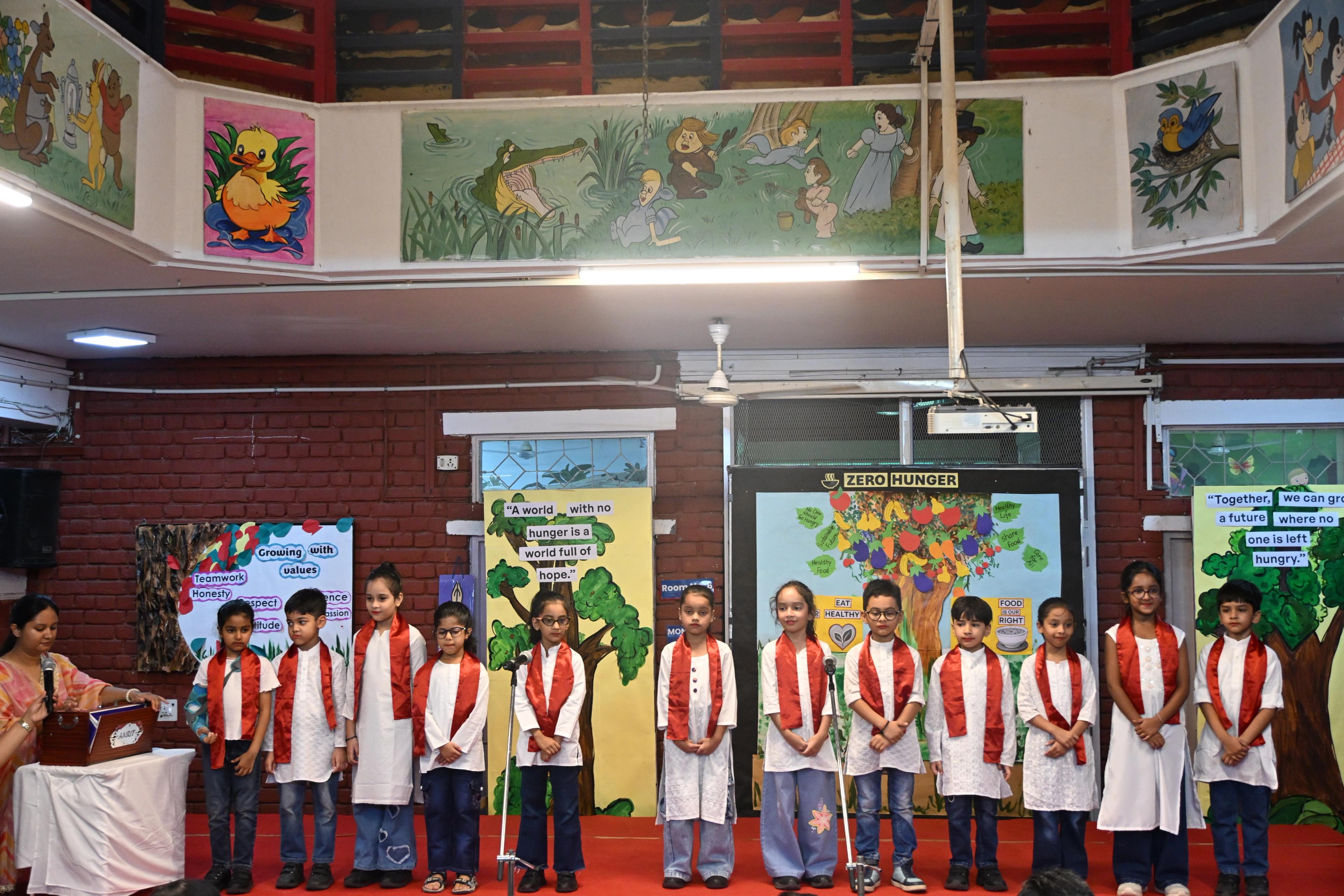 Our young learners came together on Green Day to sing the School Anthem with pride, joy, and unity.