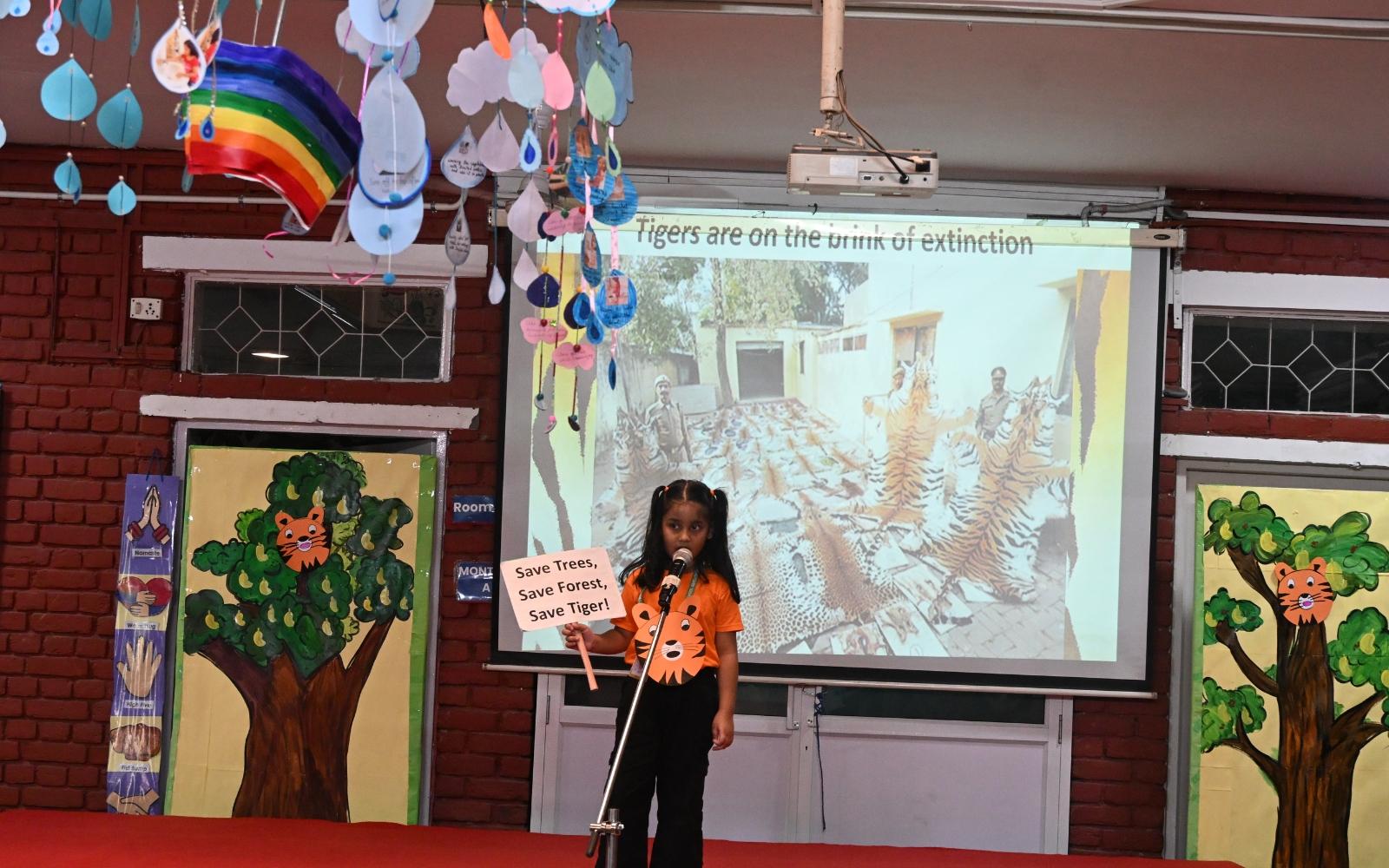 A child presenting an environmental awareness activity