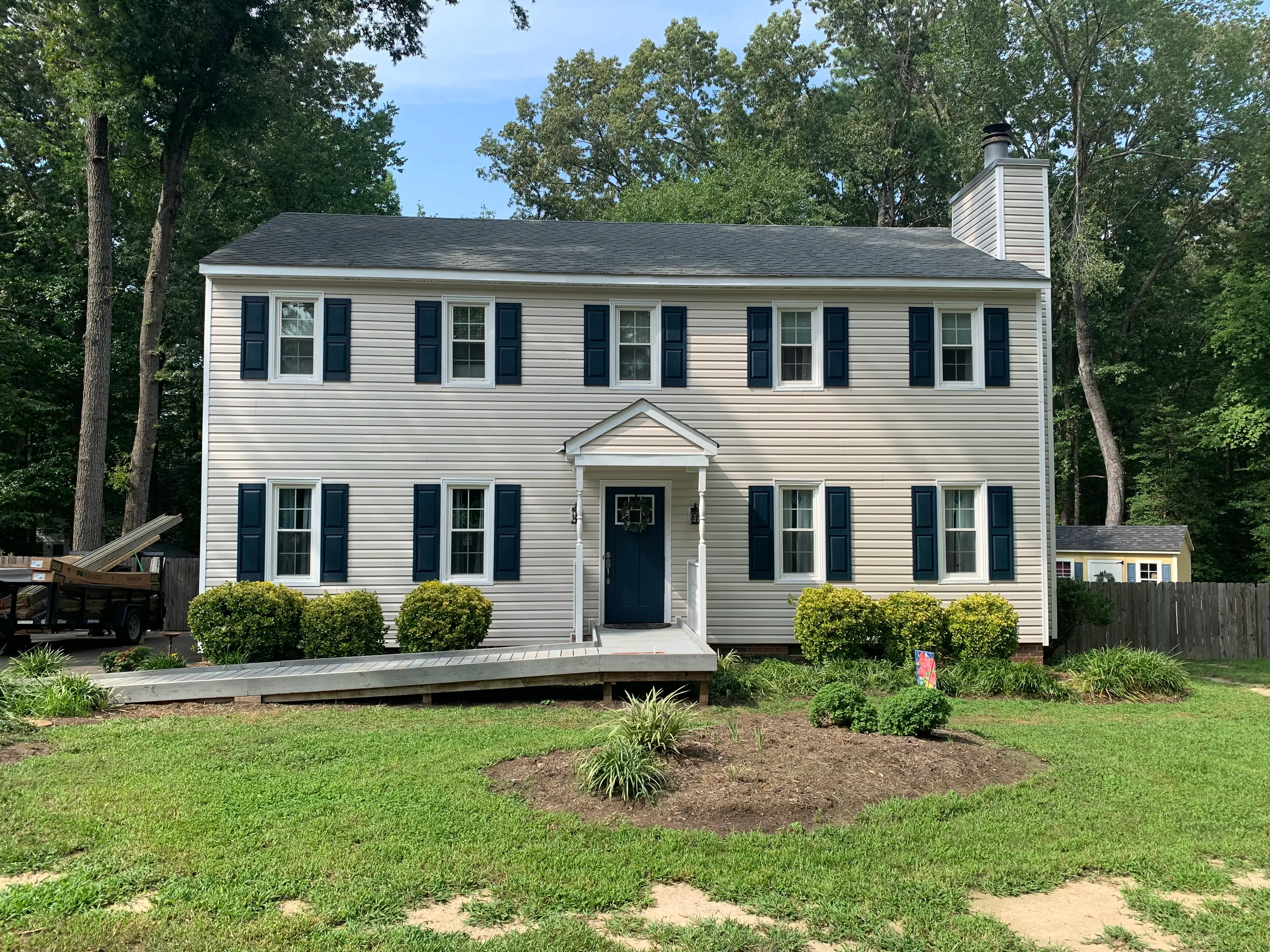 A house with new tan siding