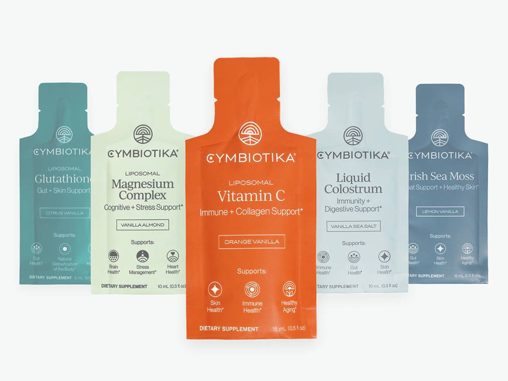 Five Cymbiotika supplement sachets: Glutathione, Magnesium Complex, Vitamin C, Liquid Colostrum, and Irish Sea Moss.