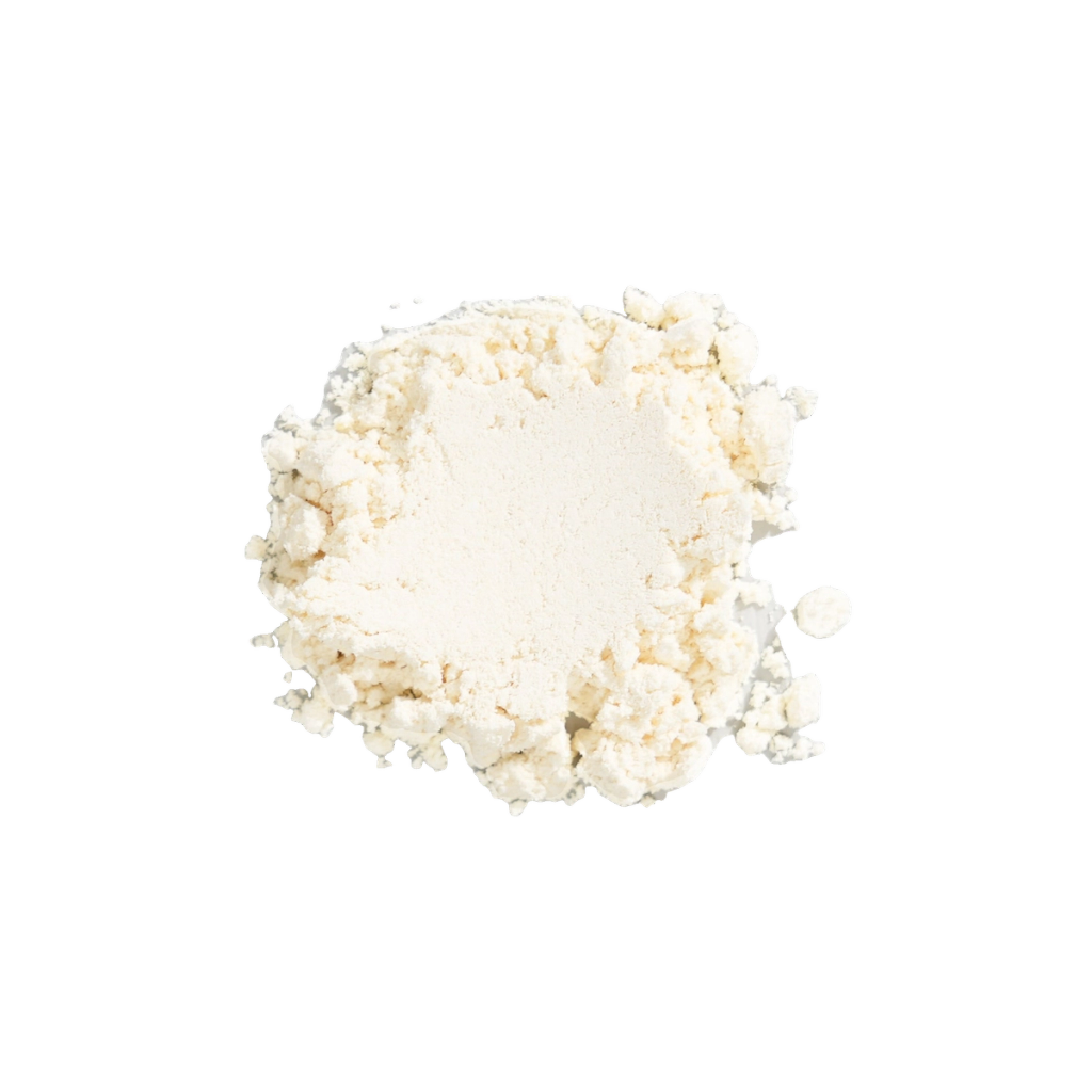 A close-up of an irregular mound of off-white powder representing an ingredient.