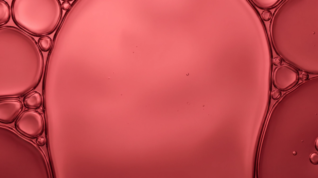 Abstract pink-red bubbles form a close-up backdrop for the Heart Health slide.