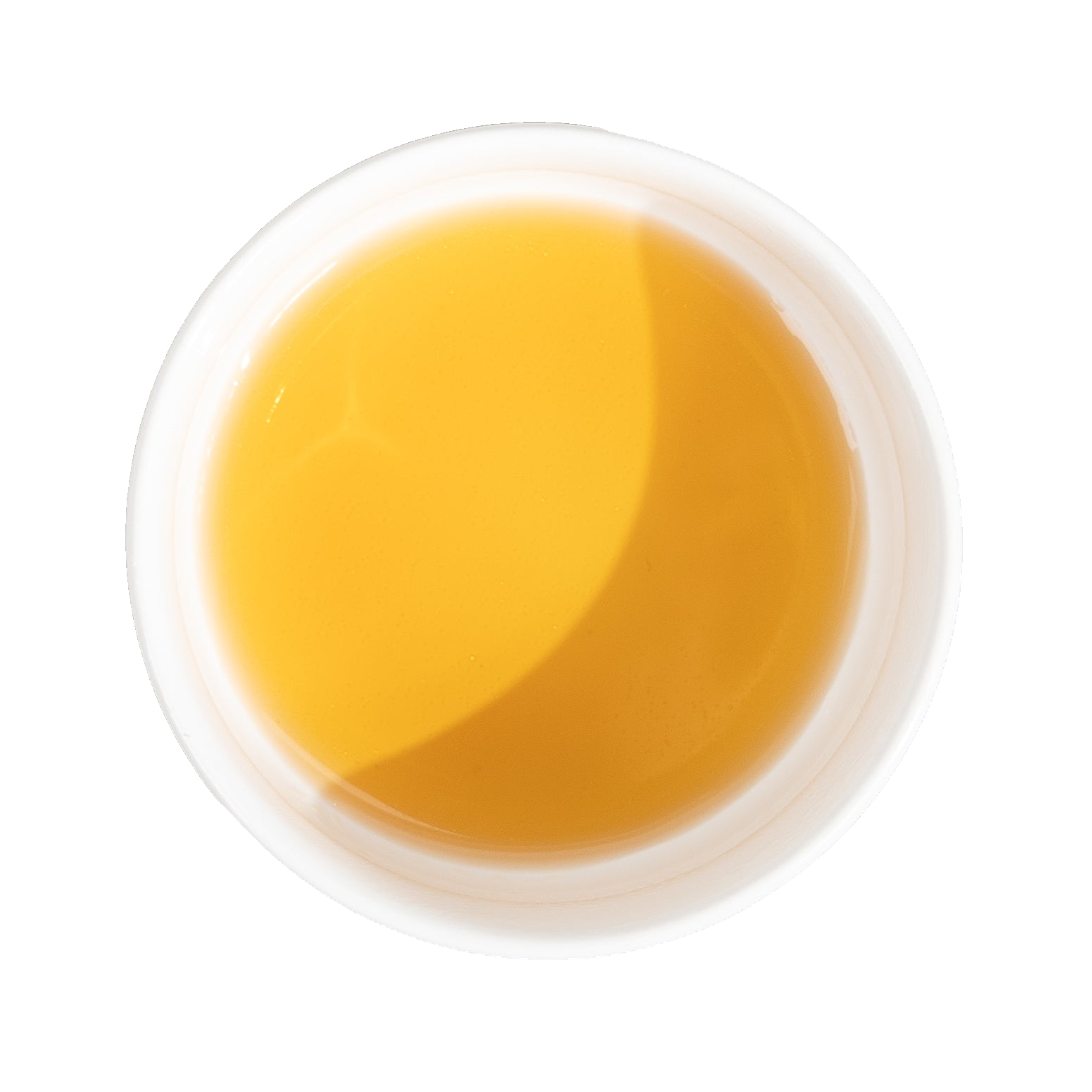 Circular pool of golden-orange liquid with a pale rim, shown from above.