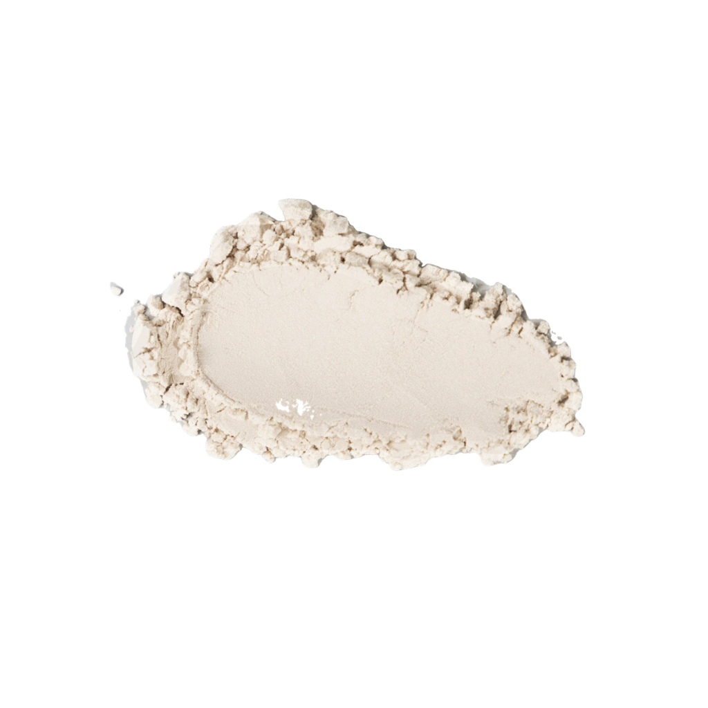 Pale cream-colored powder shown in a flattened mound.