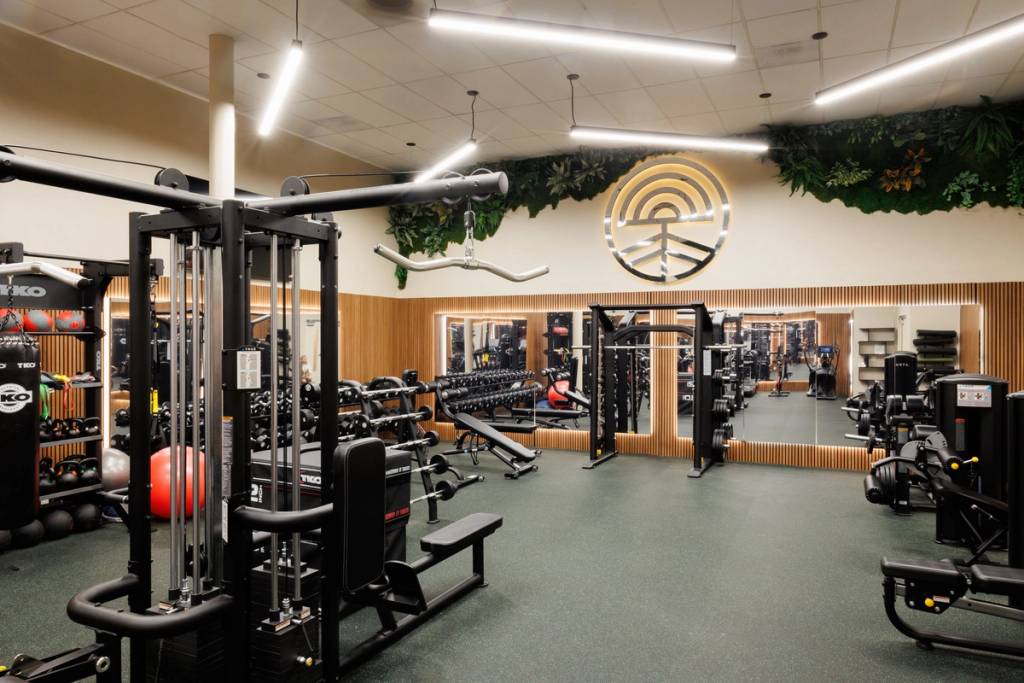 Office gym with weight machines and free weights
