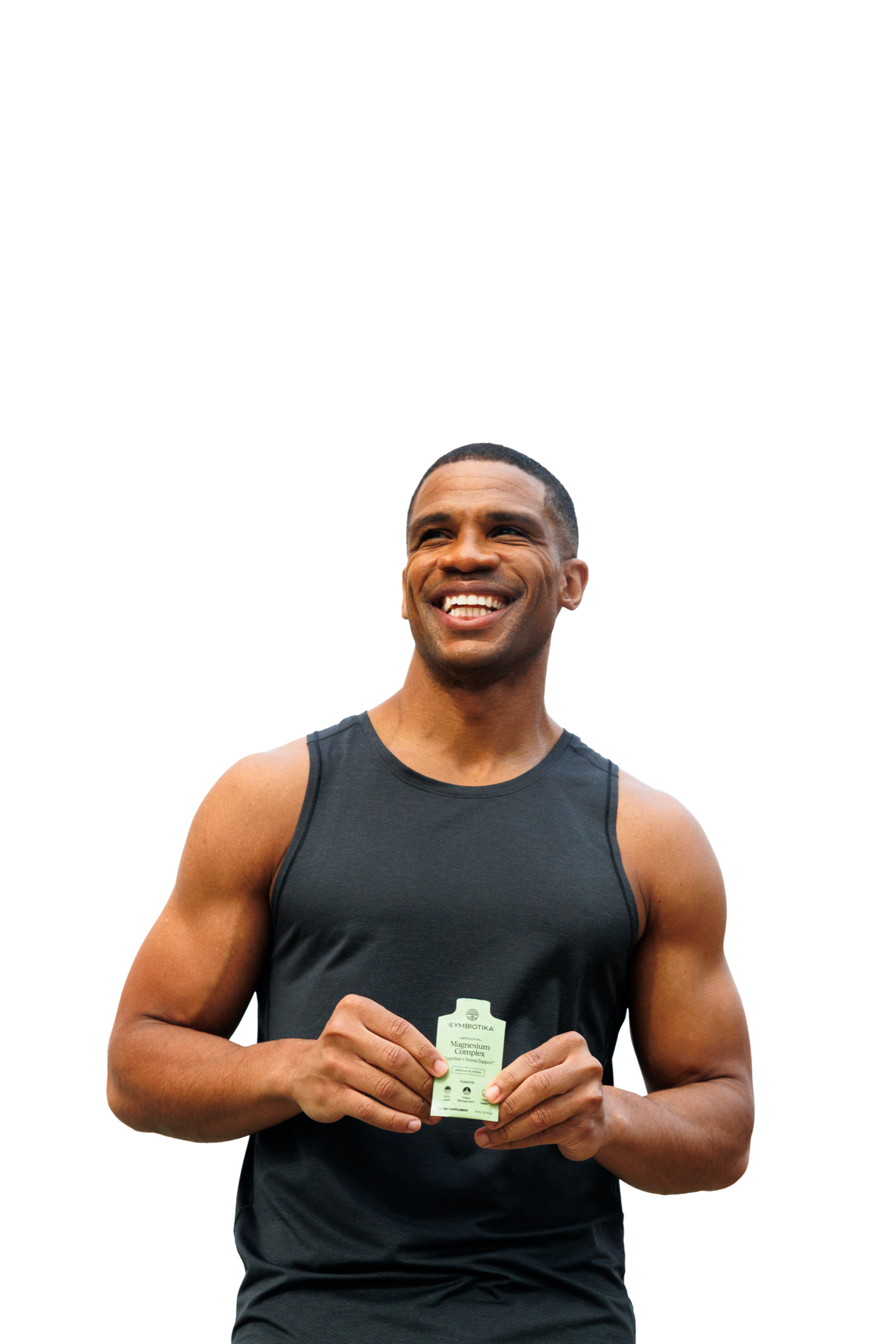 Smiling man in a black tank top holding a small green packet.