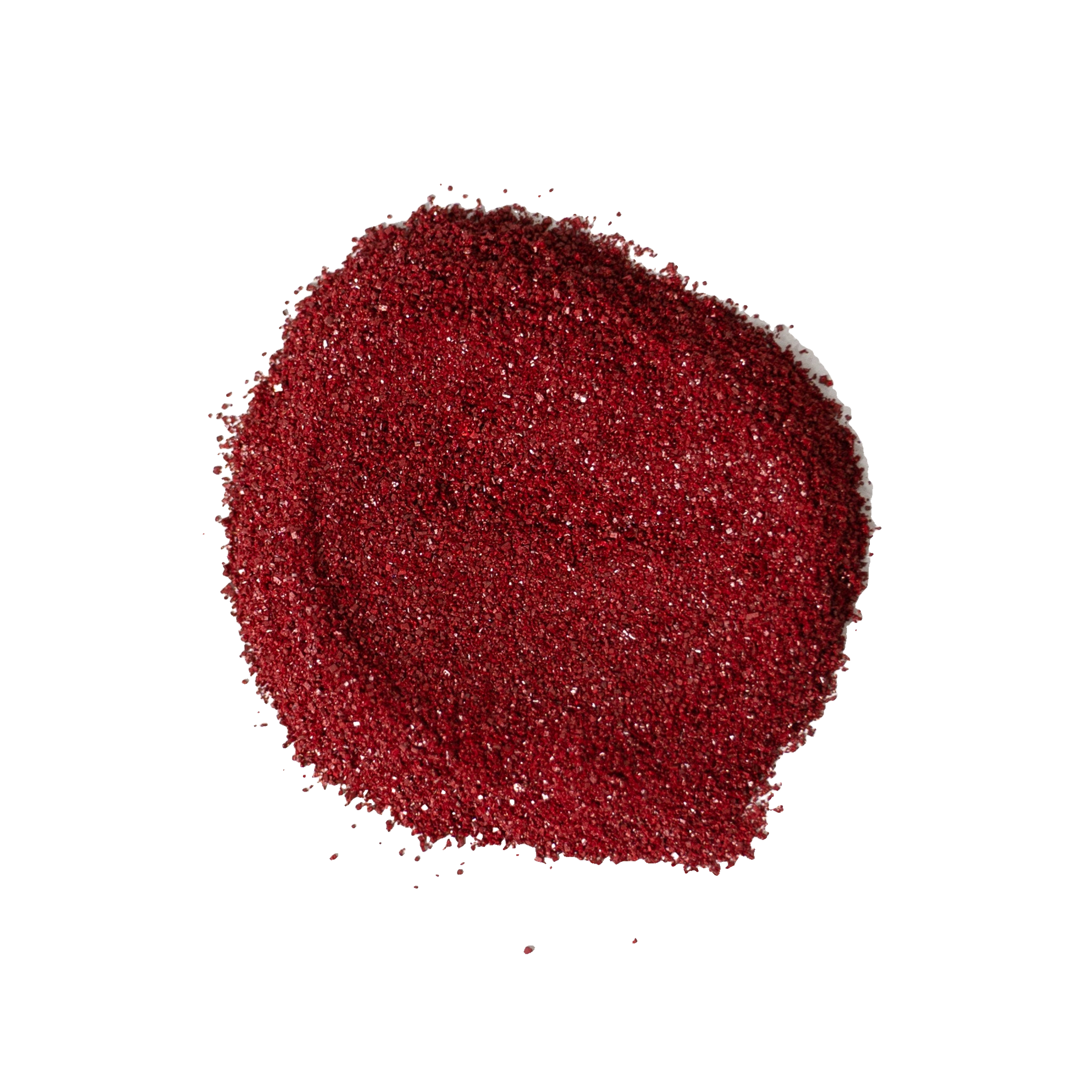 A mound of fine dark red granules, with a few scattered around its edges.
