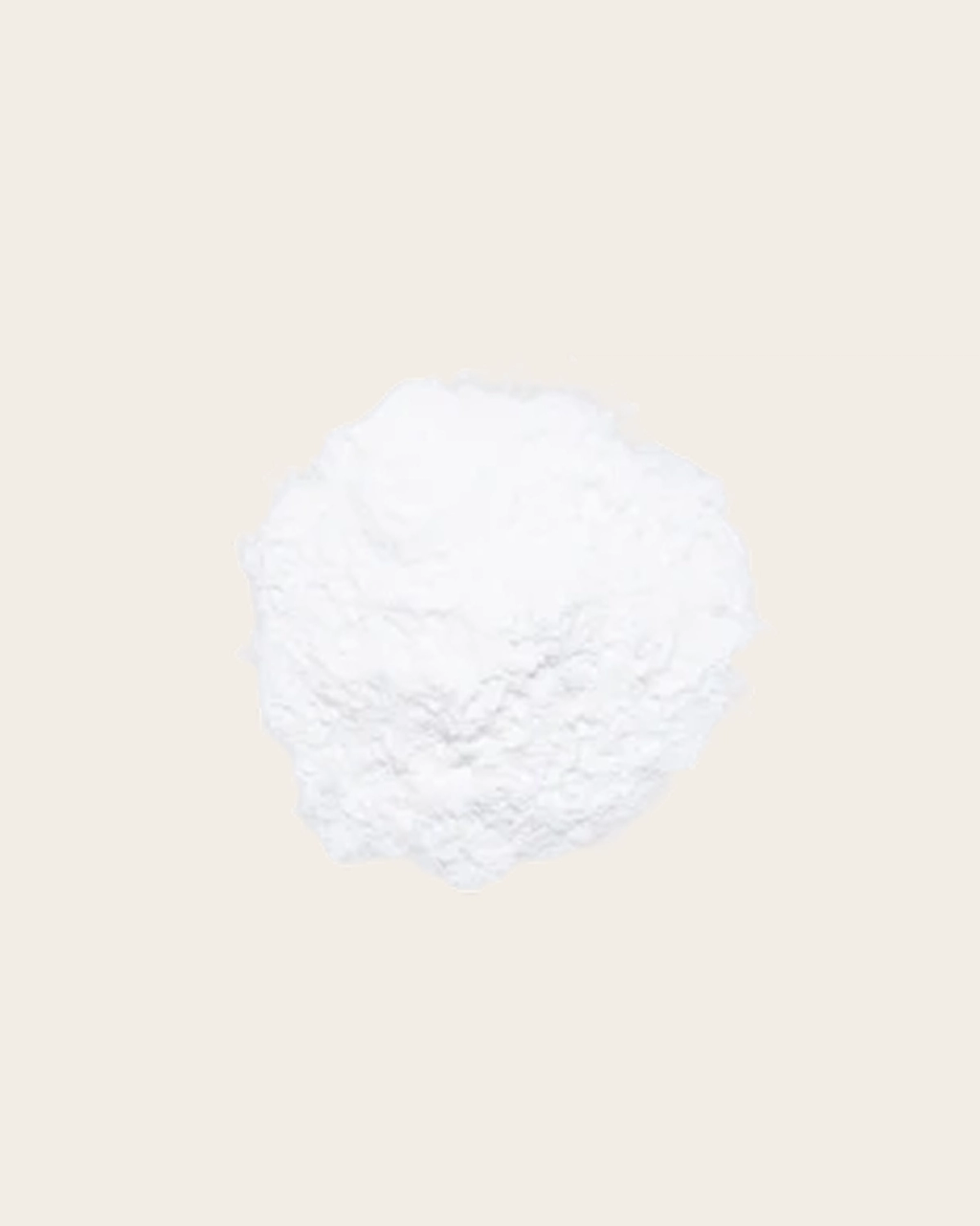 White, rough-textured irregular mound against a pale beige background, illustrating an ingredient.