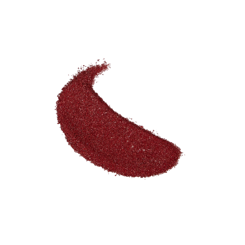 A curved sweep of fine reddish-brown granules used as an ingredient illustration.