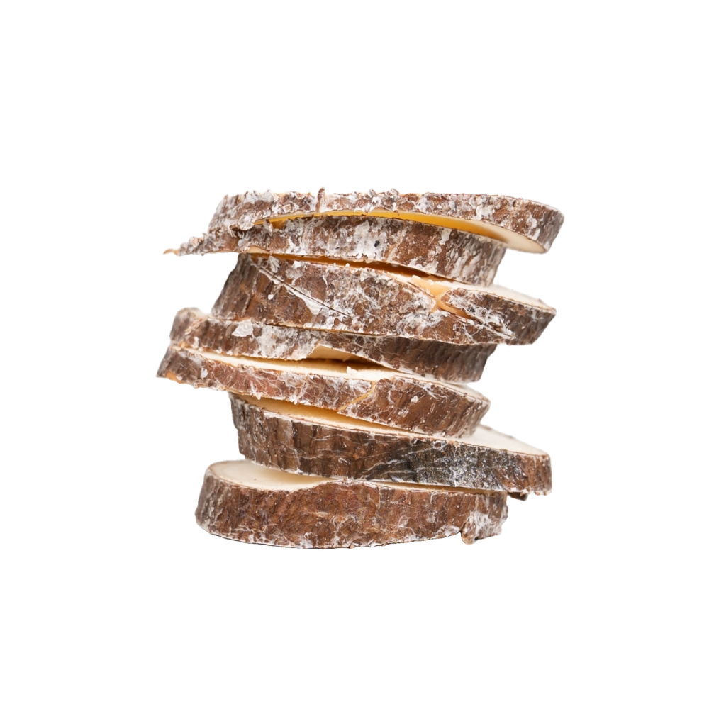 Stack of irregular brown-and-tan slices with mottled, rough surfaces, depicting an ingredient.