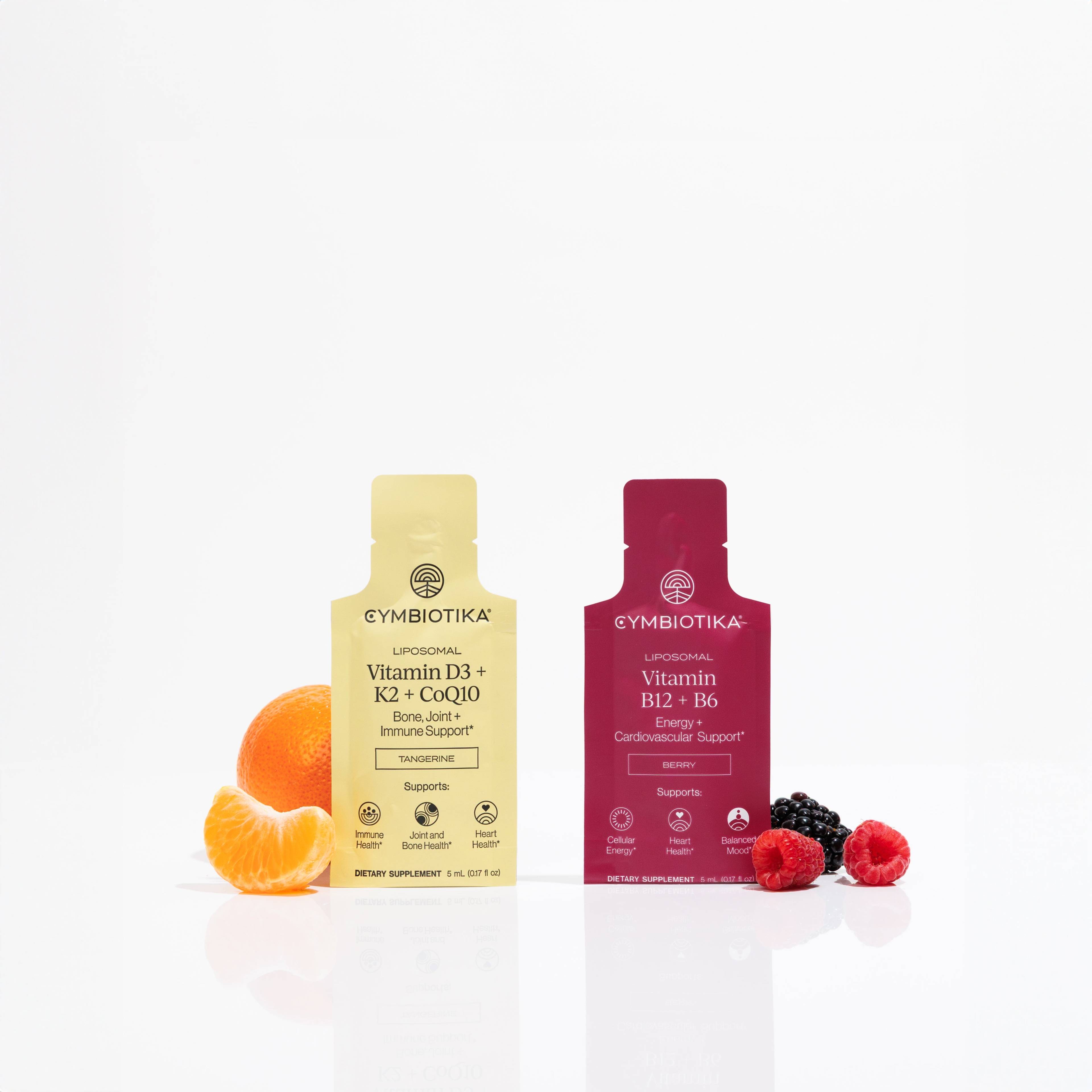 Cymbiotika Liposomal Vitamin D3 + K2 + CoQ10 and Vitamin B12 + B6 packets with citrus and berries.