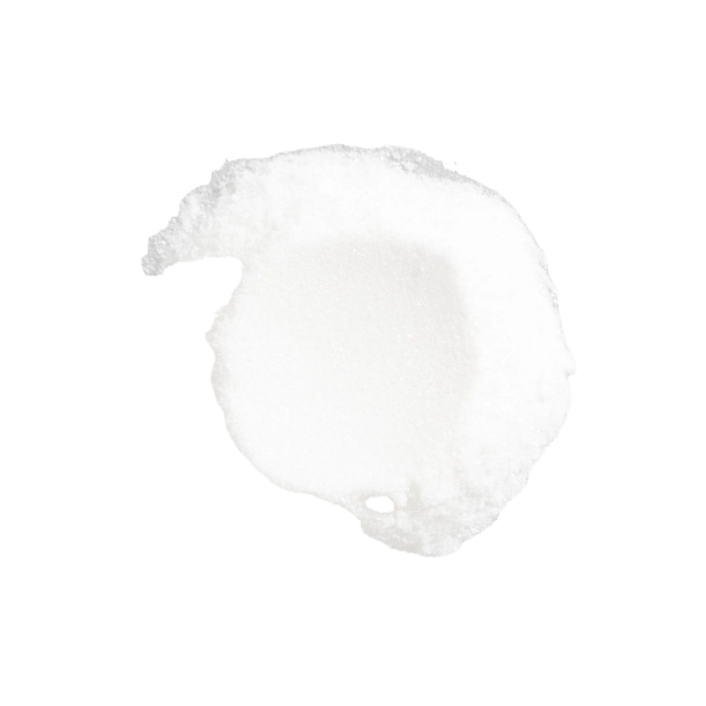 Pale, irregular textured form with a small opening near its lower edge.