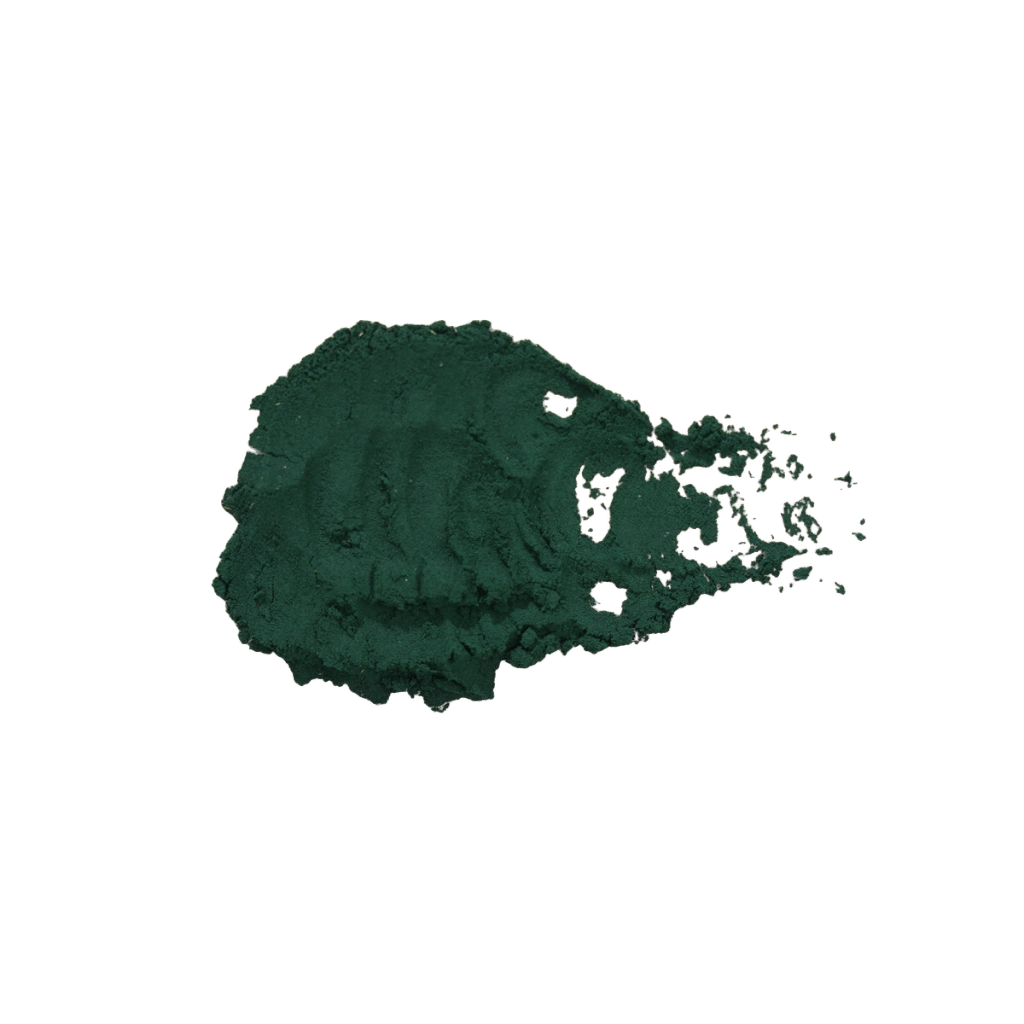 Irregular mound of dark green powder with scattered loose particles.