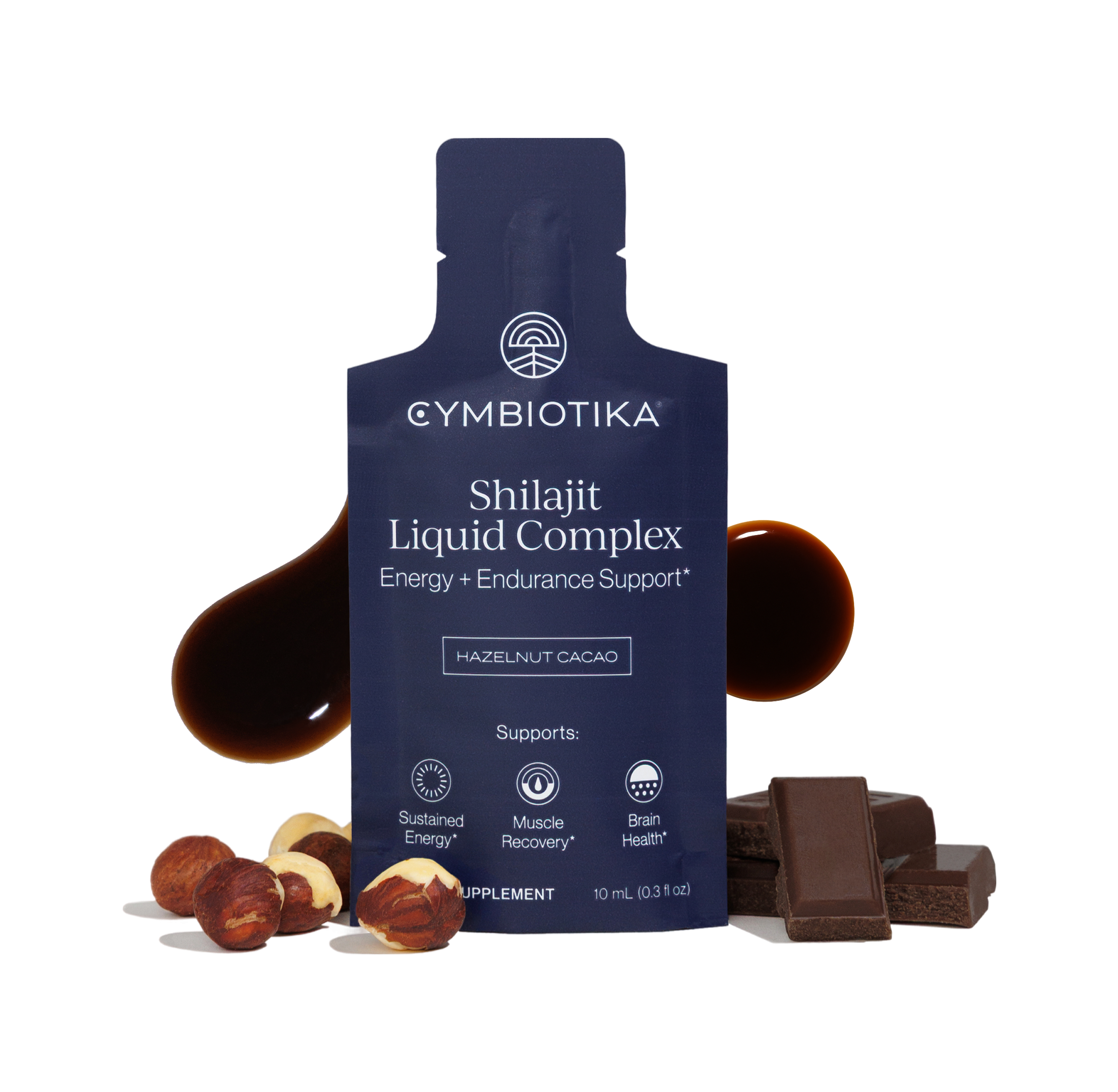 Shilajit Liquid Complex bottle with hazelnuts, cacao pieces, and a dark liquid drop; label reads “Hazelnut Cacao.”