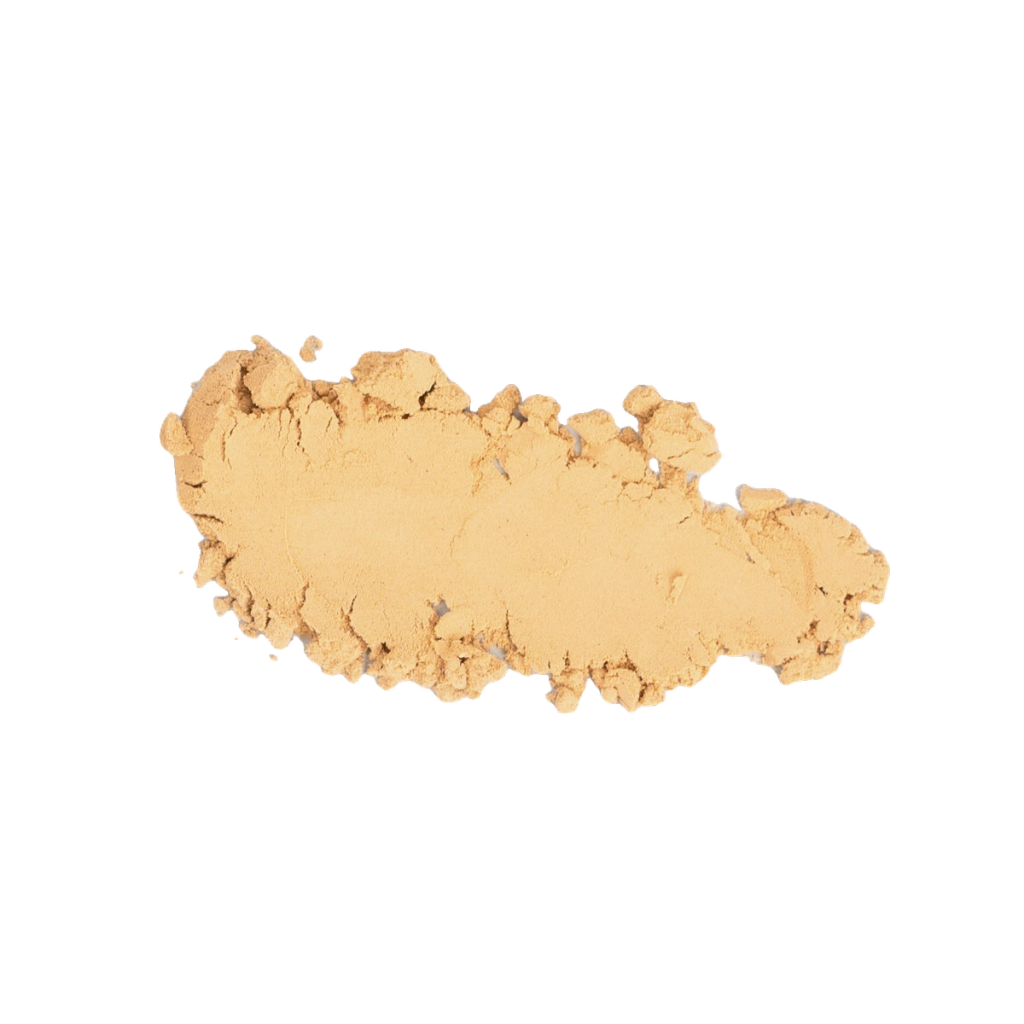 Irregular mound of pale tan powder.