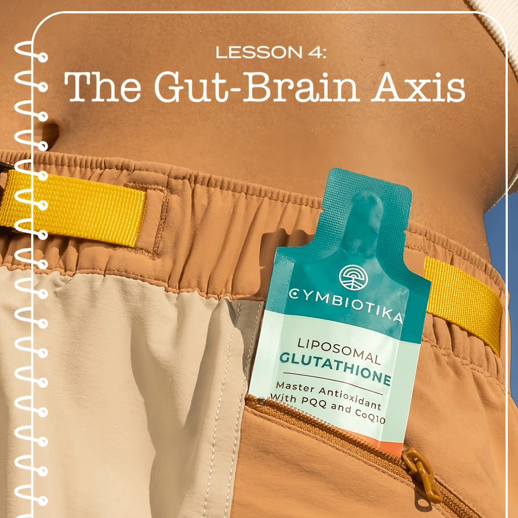 Cymbiotika Summer School Lesson 4: “The Gut-Brain Axis,” with a Liposomal Glutathione packet tucked into a shorts pocket.