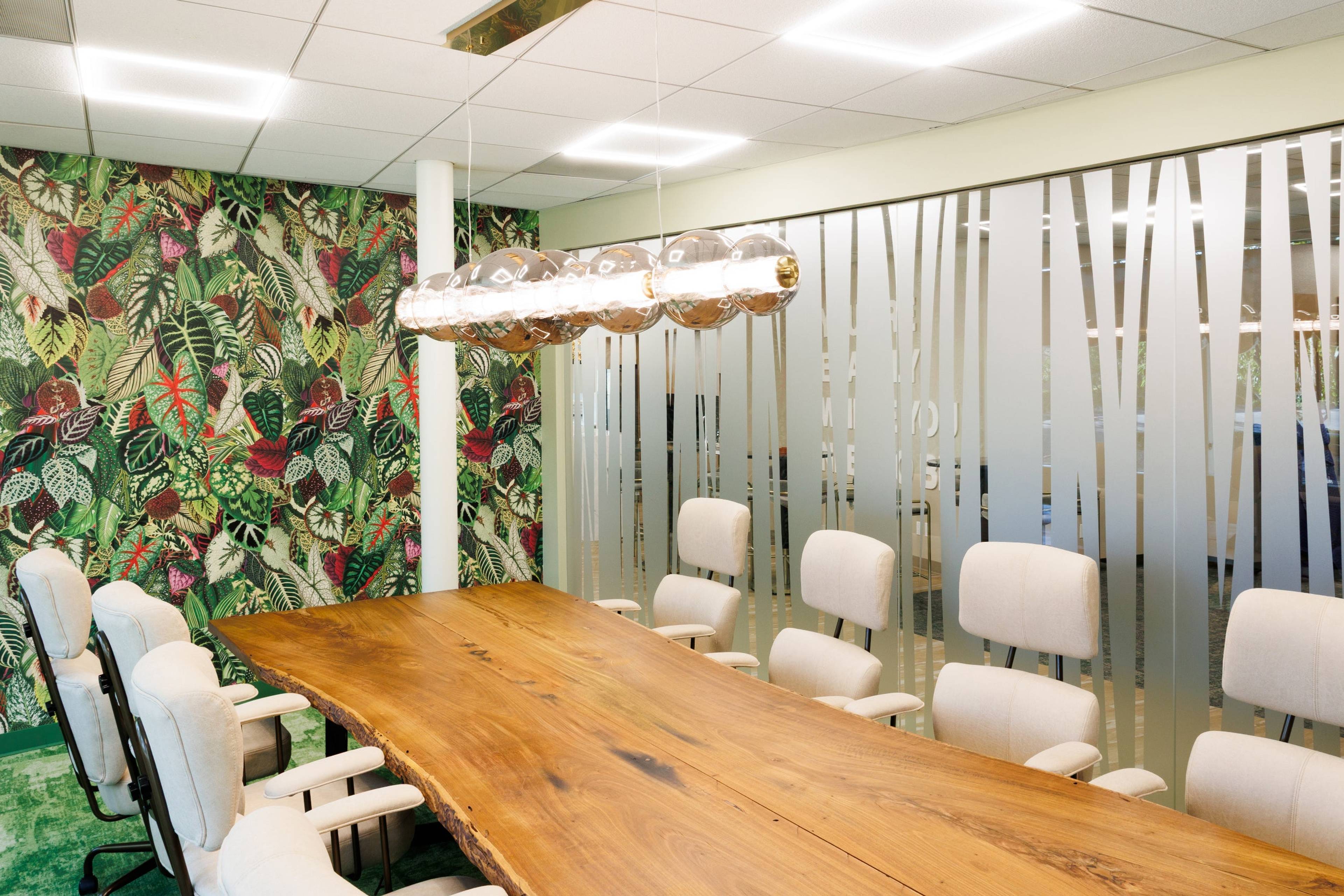 Conference room with a long wooden table