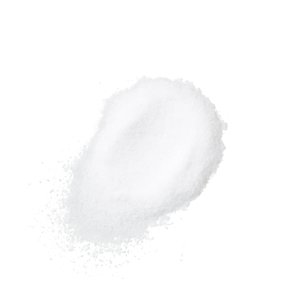 A mound of fine white powder, with loose grains scattered around it.
