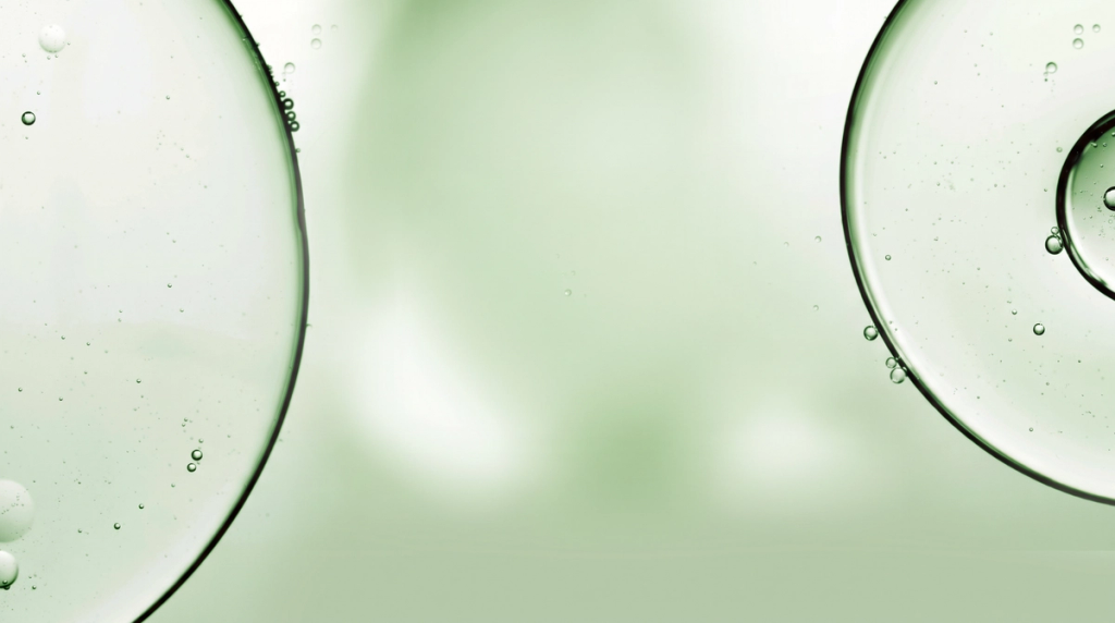 Pale green abstract composition of large translucent circles and small bubbles for the Stress Relief tab.