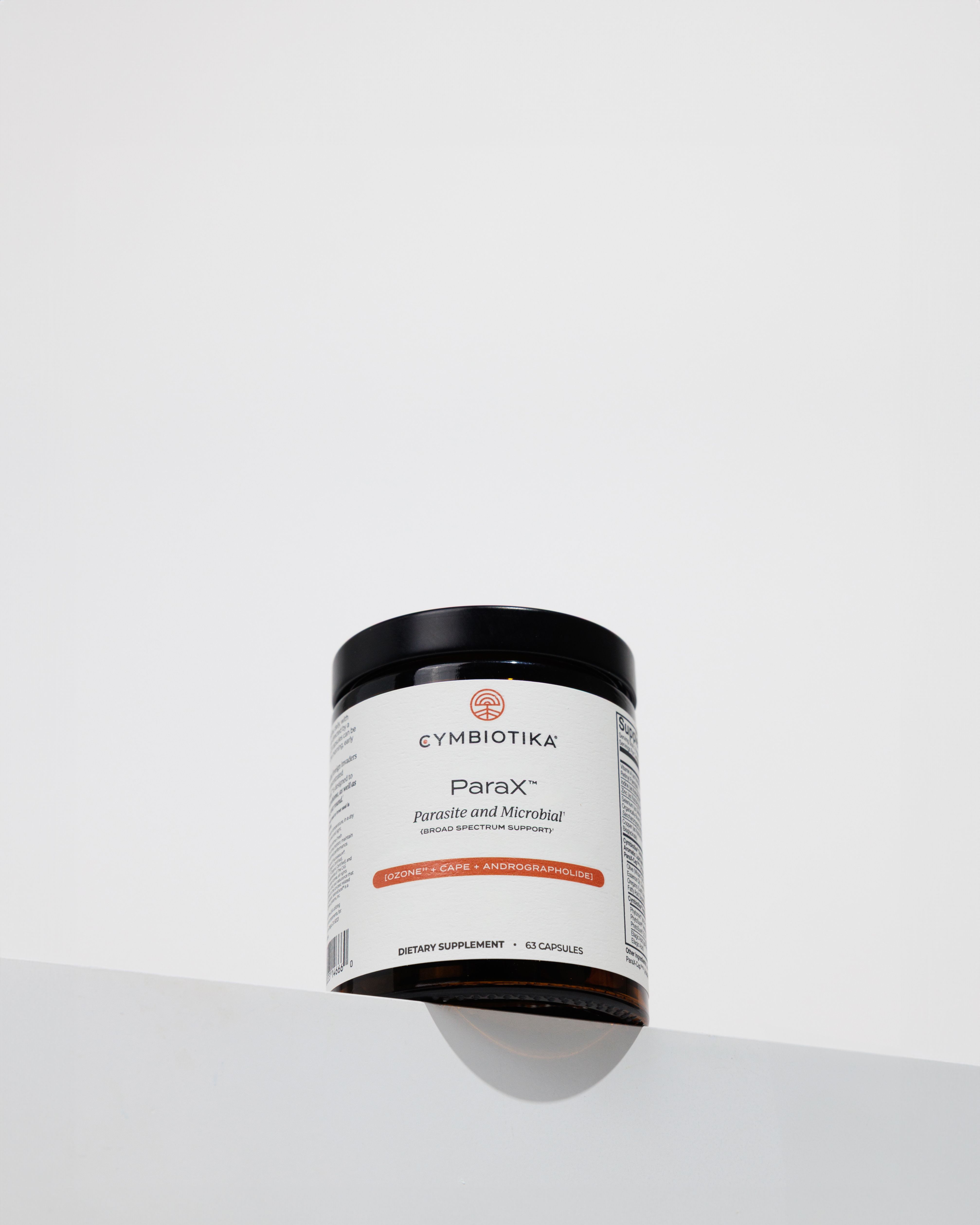 ParaX™ supplement bottle with a black cap and white label, shown upright against a light background.
