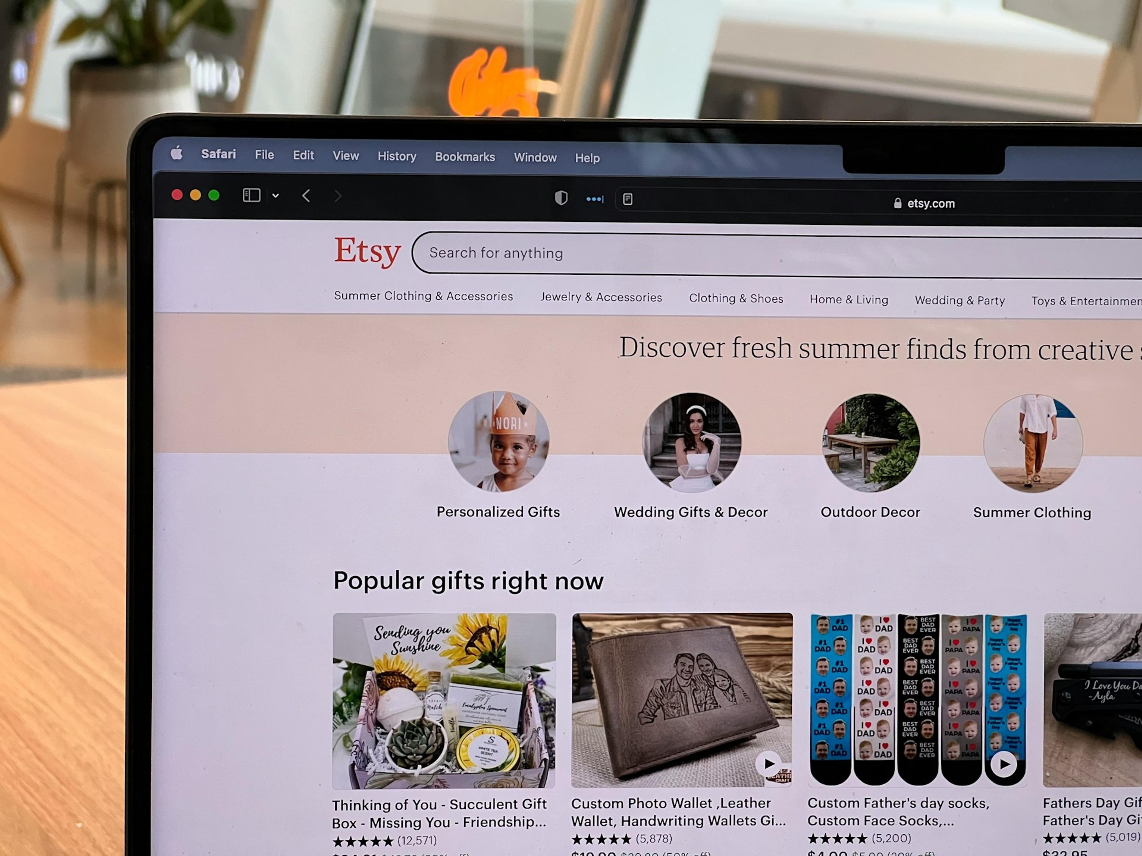A picture of a laptop's screen showing Etsy Marketplace in the browser.