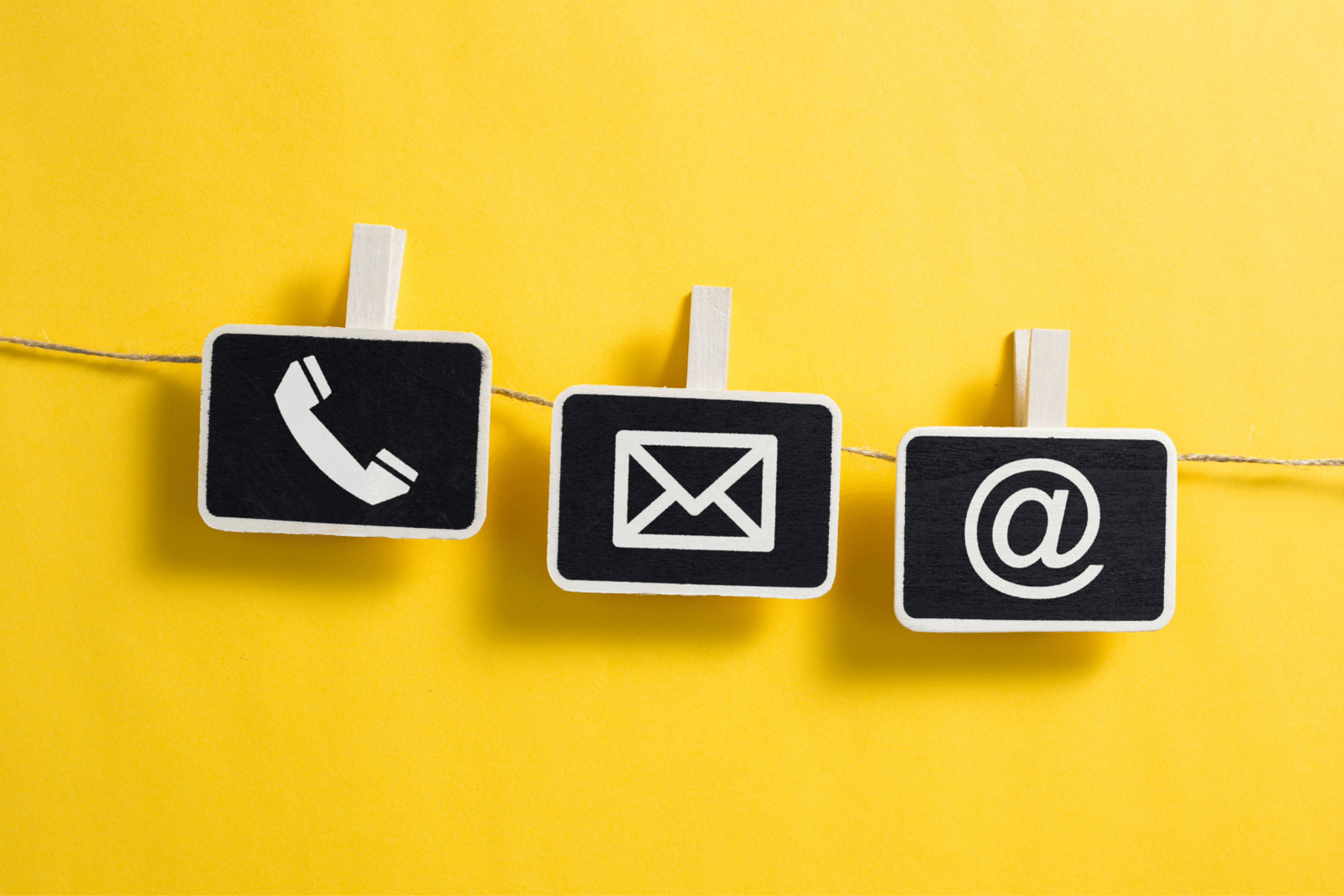 Icons showing telephone, email and letter signs.