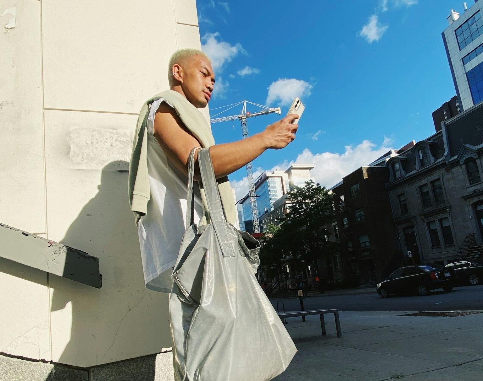 TikTok Creator recording a selfie video on the street