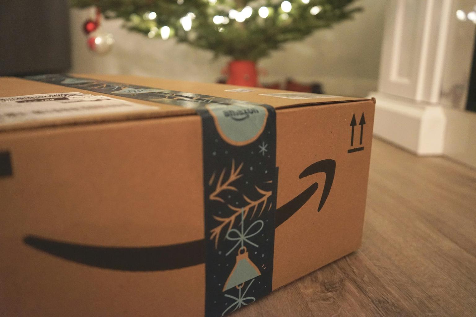 Image of an Prime box from an Amazon FBA seller under a Christmas tree