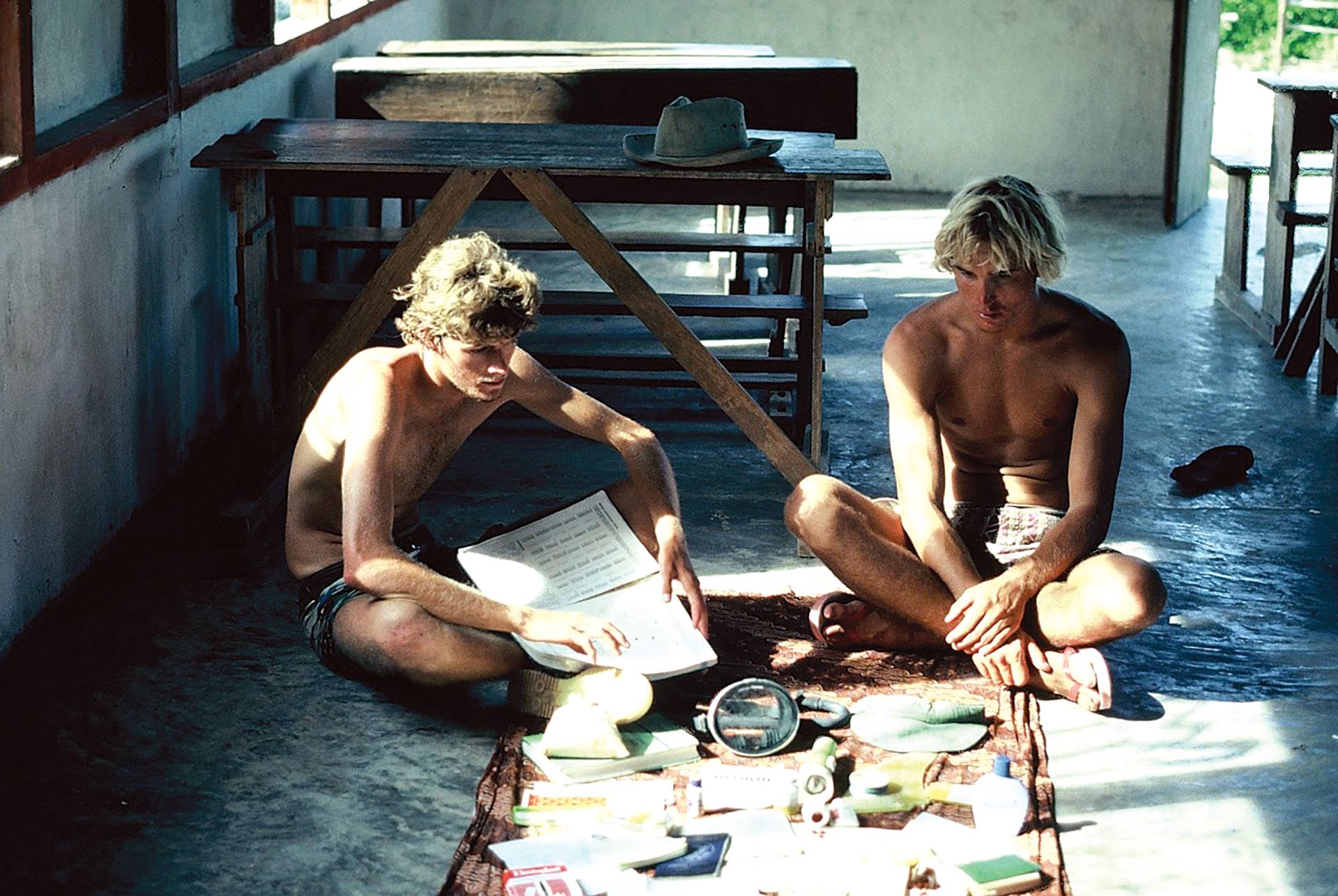 Chris Goodnow (left) and Scott Wakefield checking their expedition supplies, which were basic but enough to get them through a long stint in the jungle at Pasongan Bay. - Tony Fitzpatrick