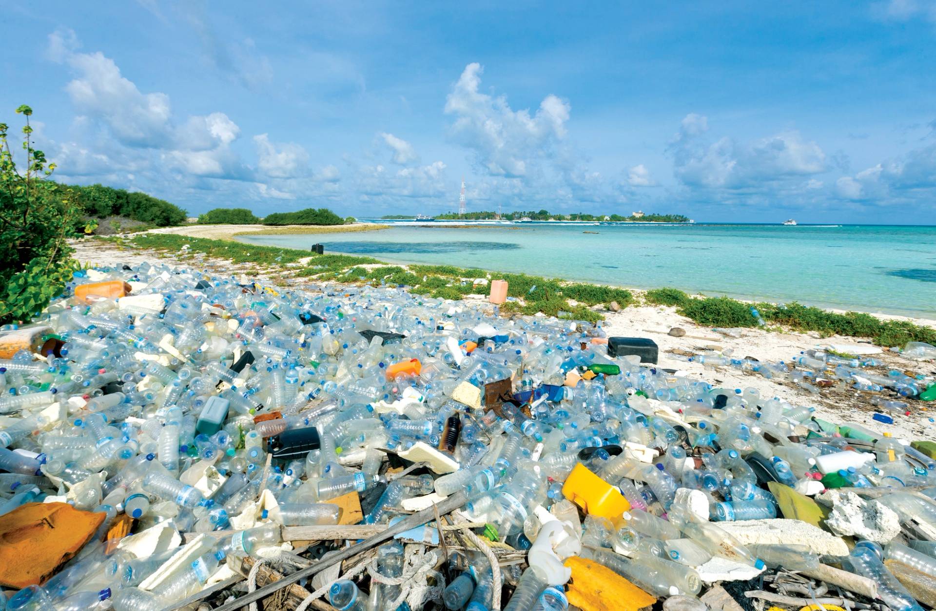 Humans produce 300 million tons of plastic annually, then dump 8 million tons of it into our oceans every year.  North Malé Atoll, Maldives. by Ricardo Bravo